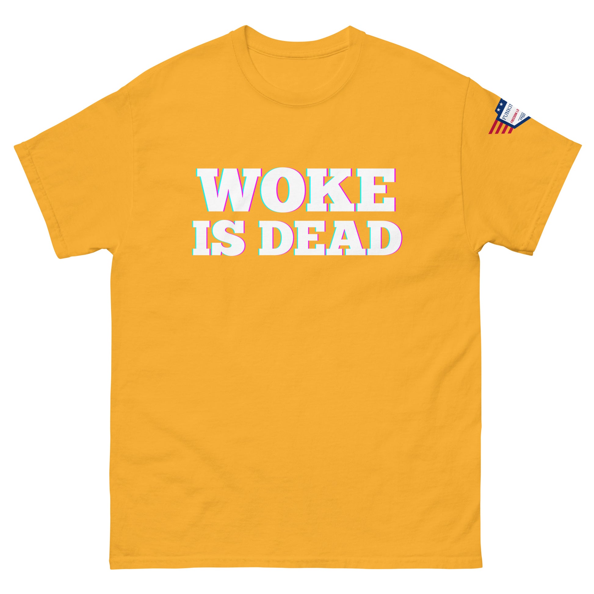 Front view of bright gold unisex tee with bold white "WOKE IS DEAD" glitch effect and US flag patch