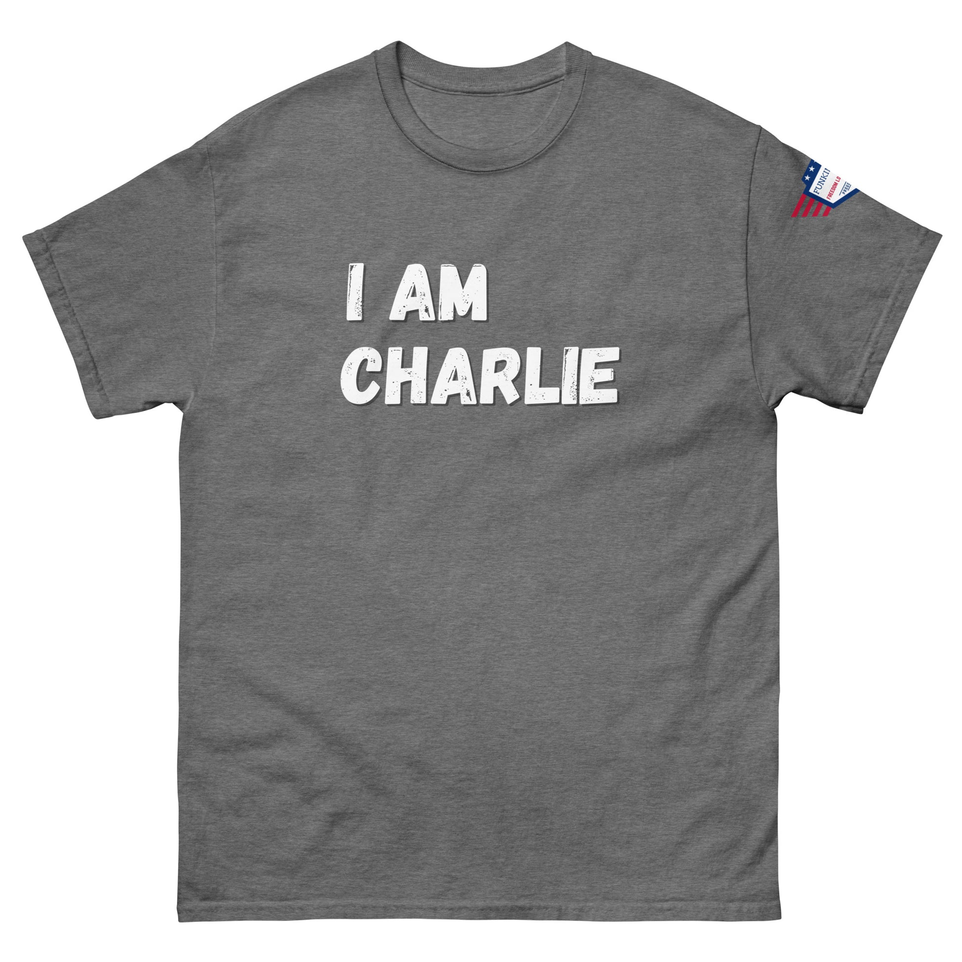 Front view of charcoal heather unisex tee with bold white "I AM CHARLIE" graphic and USA flag sleeve patch