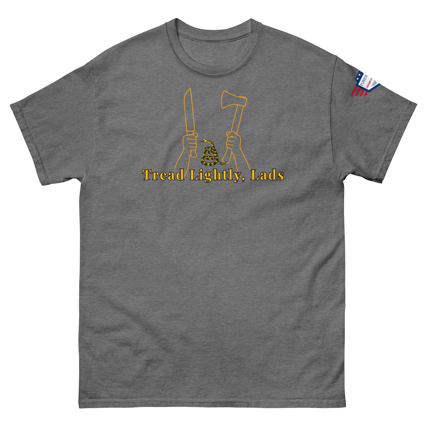 Front charcoal gray tee showing yellow "Tread Lightly, Lads" design—knife & axe in hands with coiled snake, flag sleeve accent