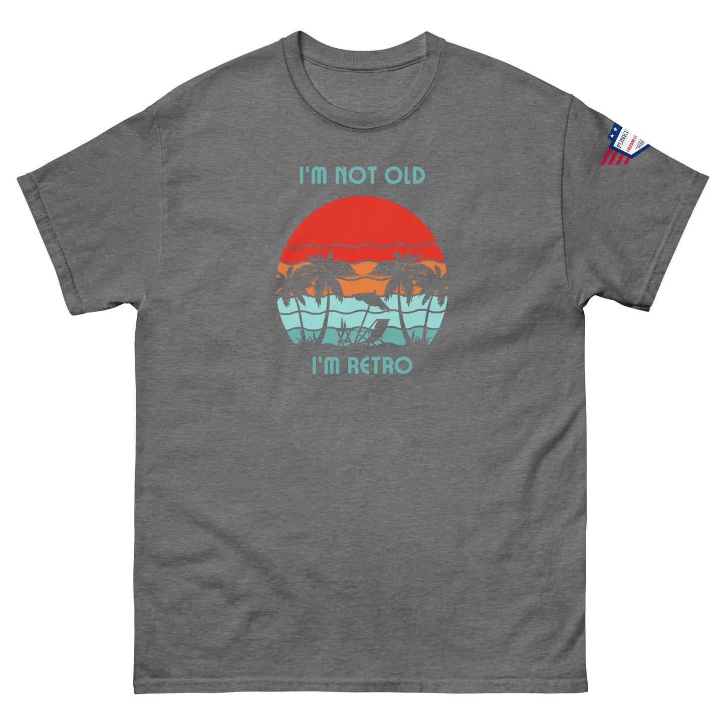 Front view of dark heather gray unisex t-shirt "I'm not old I'm retro" with retro sun and palms