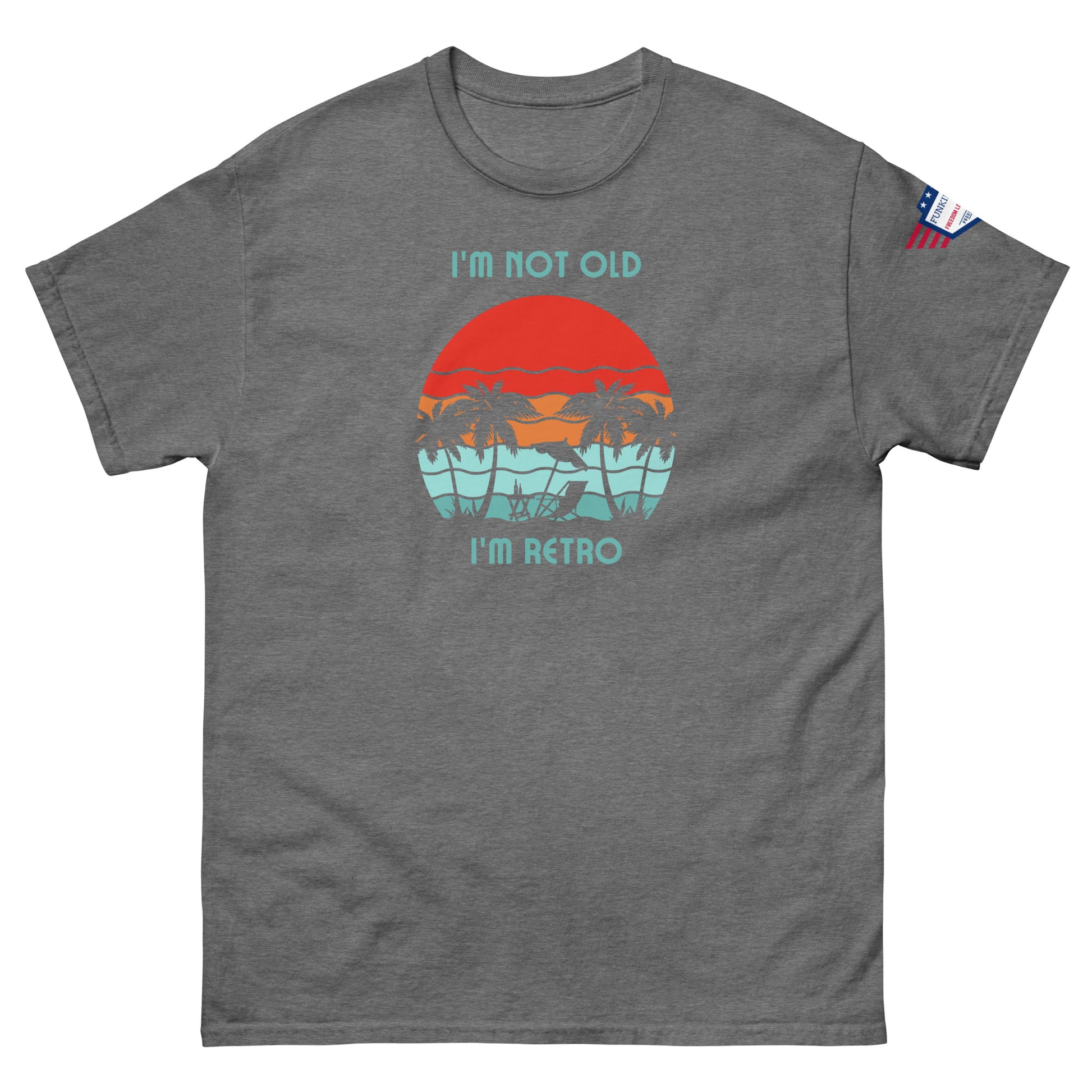Front view of dark heather gray unisex t-shirt "I'm not old I'm retro" with retro sun and palms
