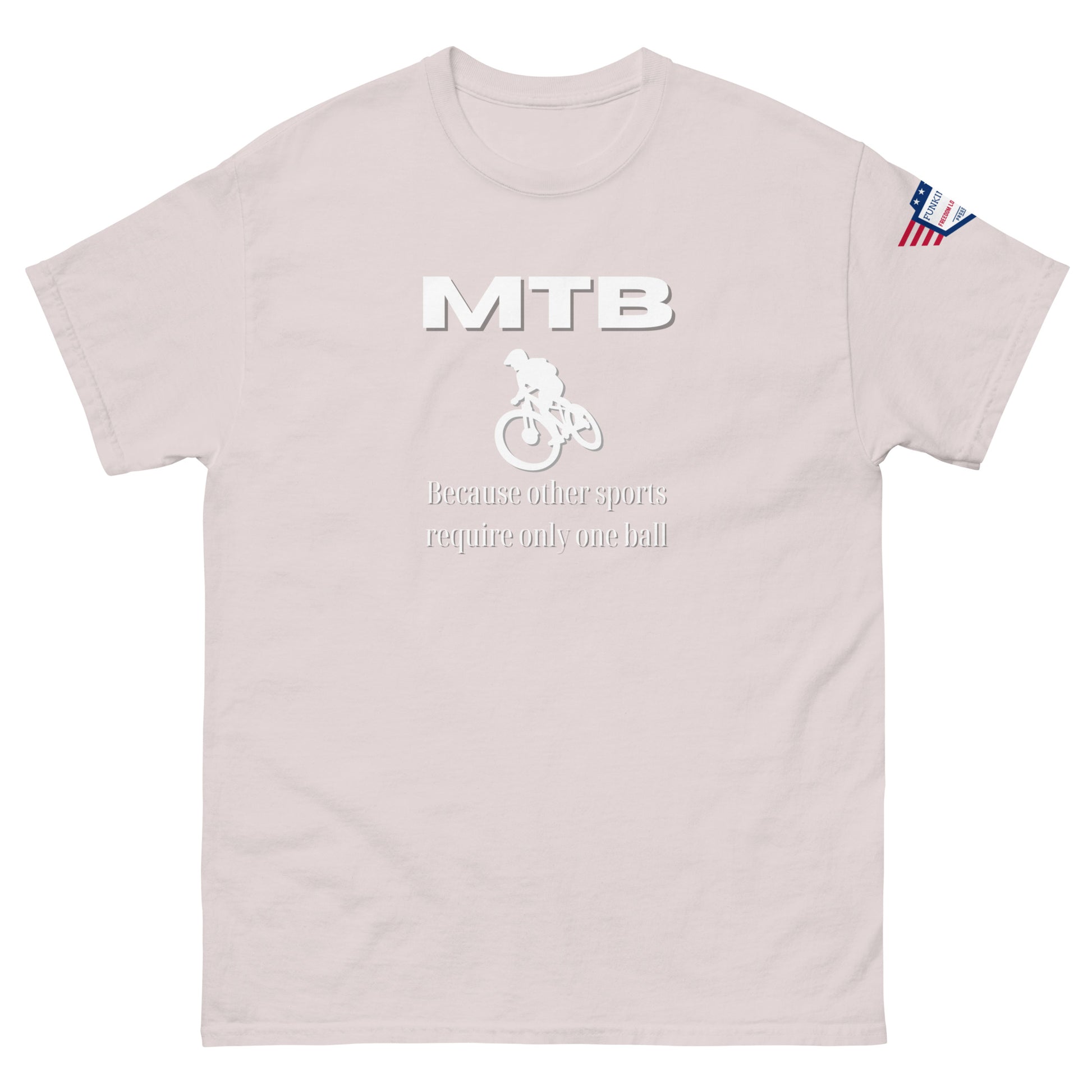 Front view of light pink unisex tee with white "MTB" lettering, bike graphic, "Because other sports require only one ball" text, flag patch
