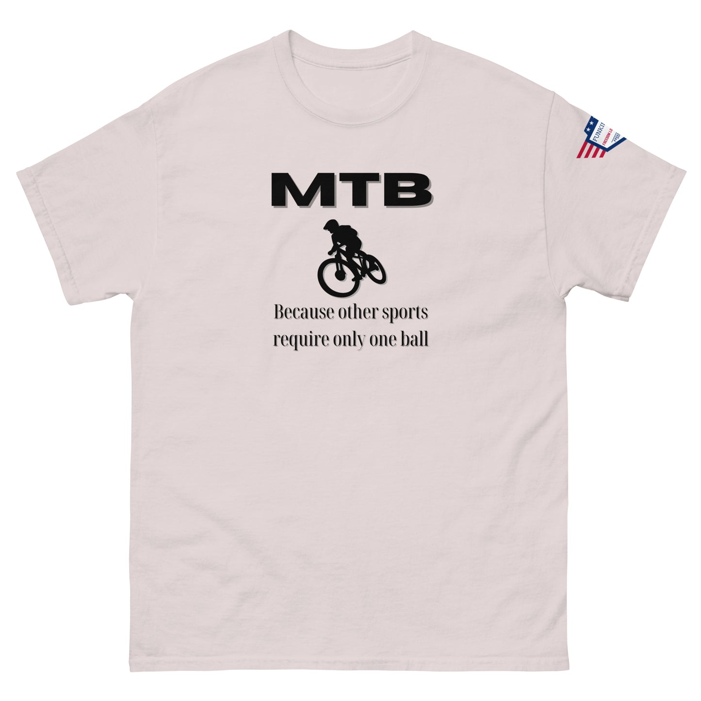 Front view of light ash classic unisex tee with bold black "MTB" print, biker silhouette, and "Because other sports require only one ball" text