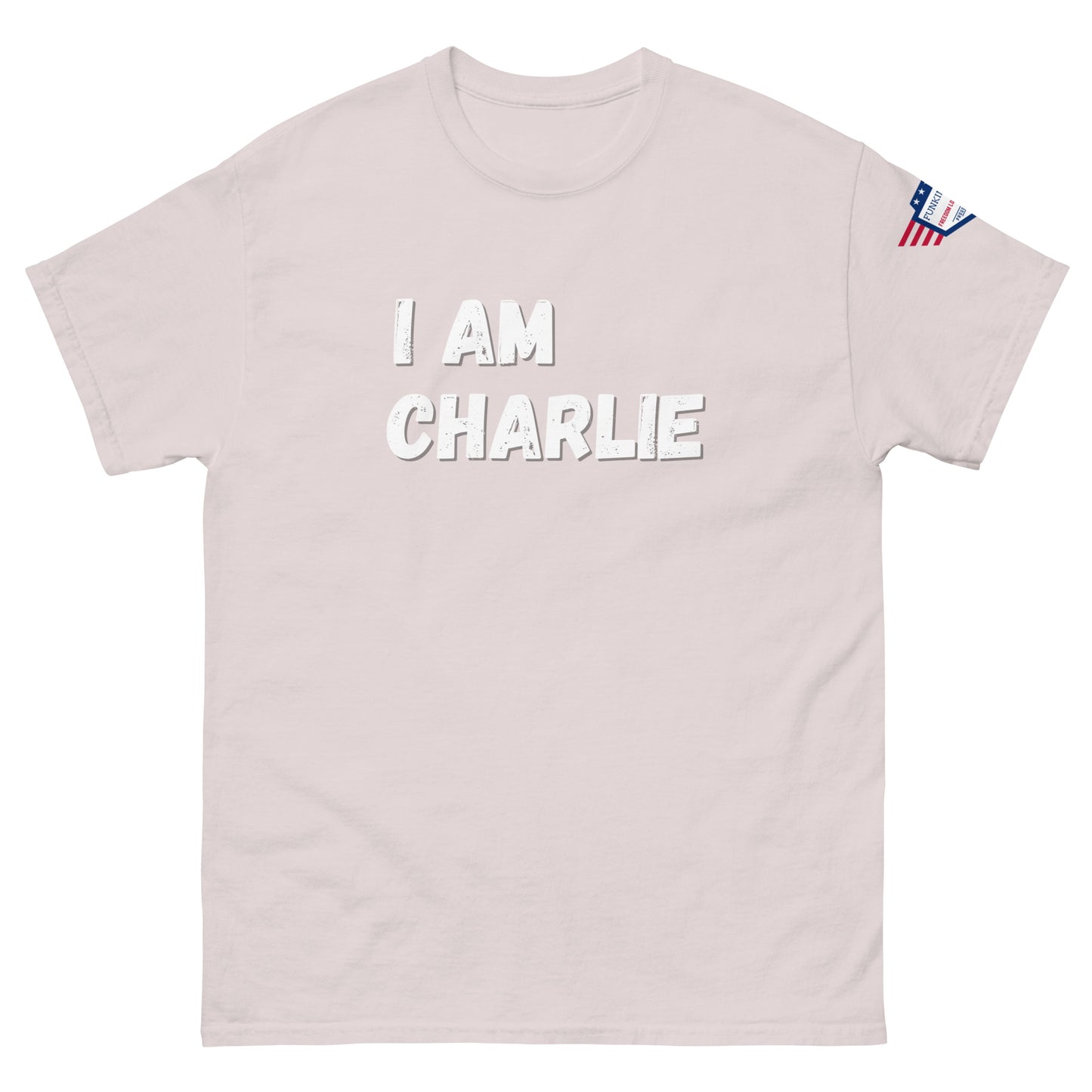 Front view of ash gray unisex tee with bold white "I AM CHARLIE" graphic and small USA flag sleeve patch