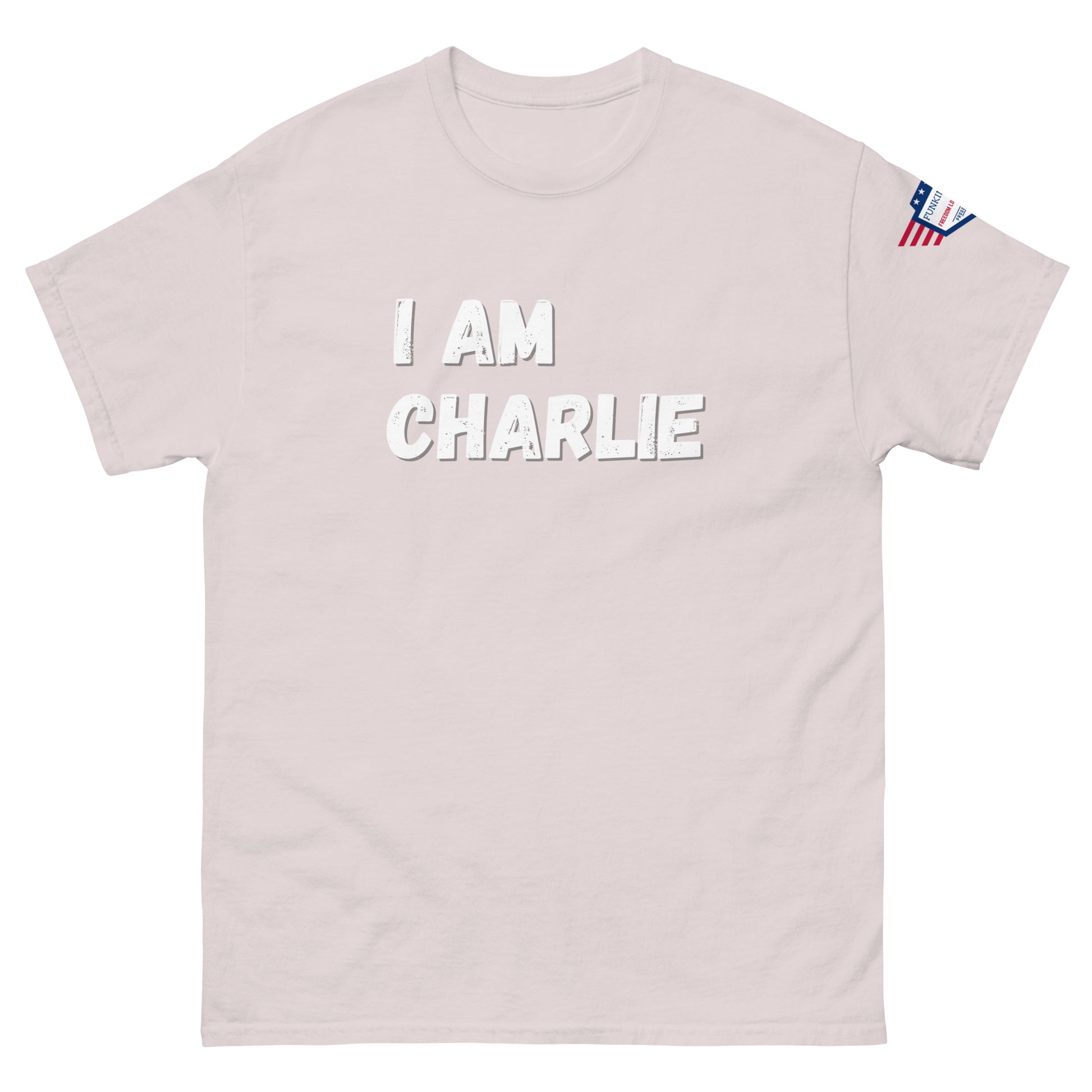 Front view of ash gray unisex tee with bold white "I AM CHARLIE" graphic and small USA flag sleeve patch