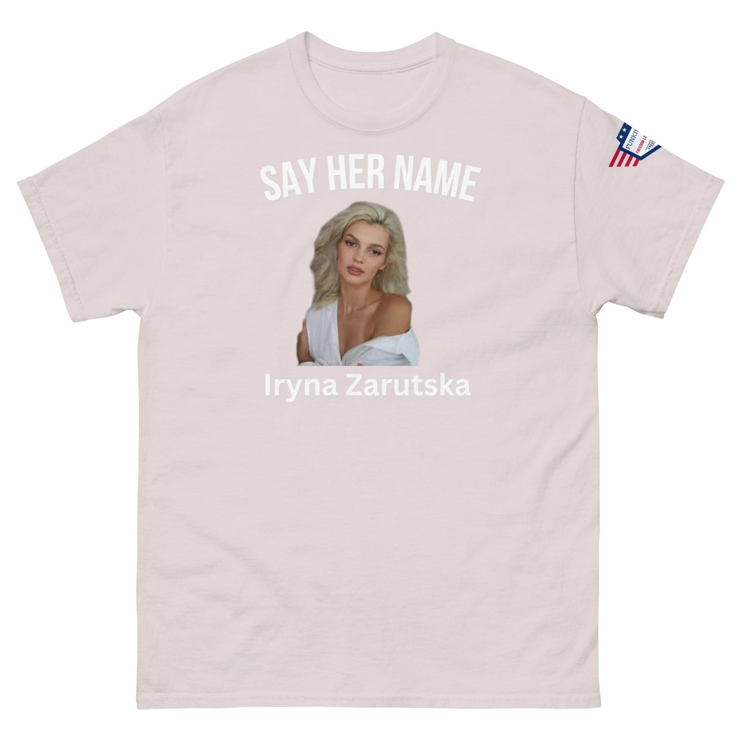 Front view of light ash "SAY HER NAME Iryna Zarzutska" meme tee, subtle USA sleeve flag
