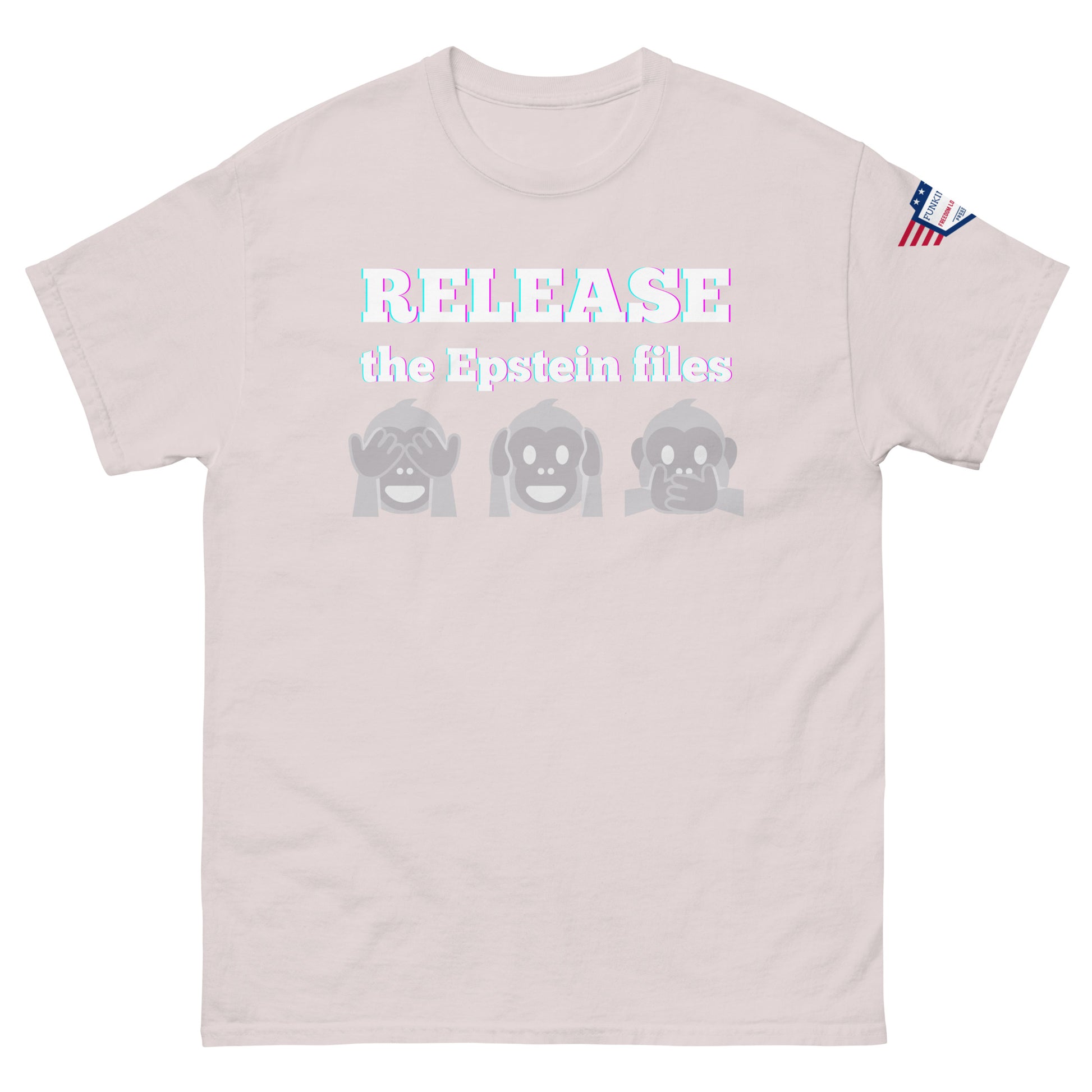 Front view of light pink unisex tee with "RELEASEASE the Epstein files" print and three gray see-no-evil monkeys, USA flag shoulder patch