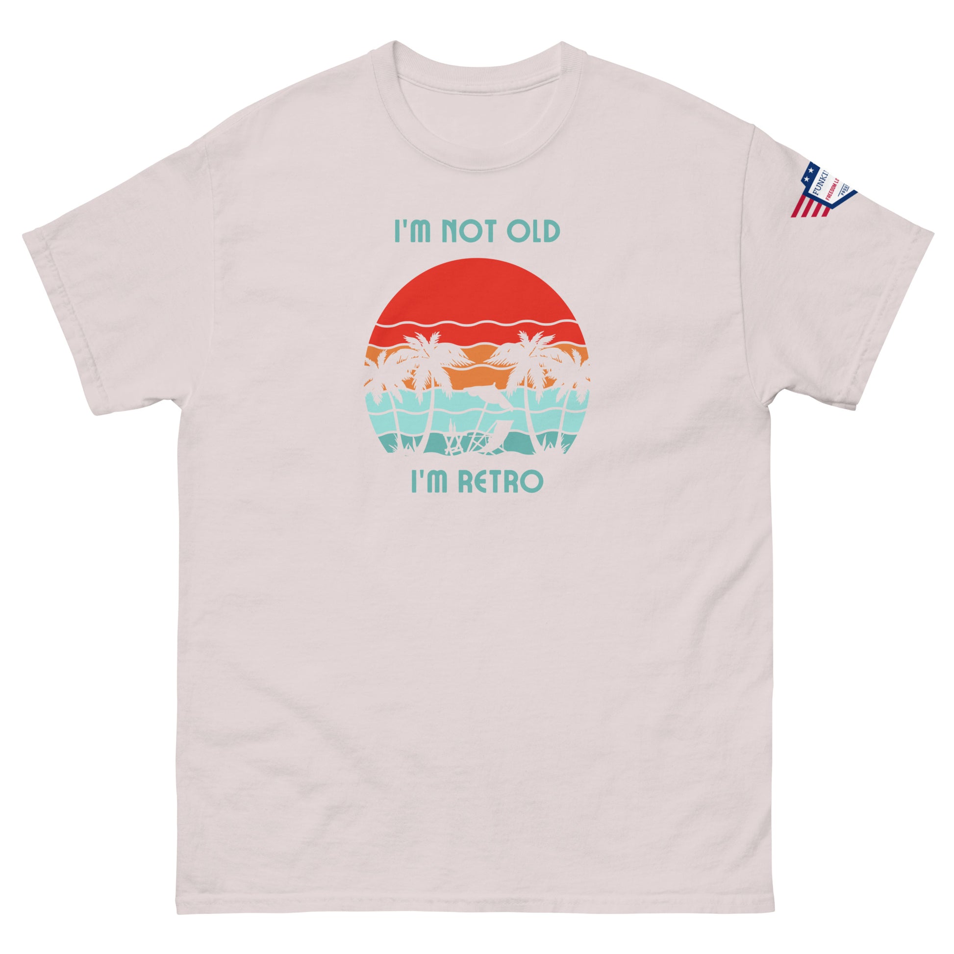 Front view of ash pink unisex t-shirt print: "I'm not old I'm retro" sunset waves and palms
