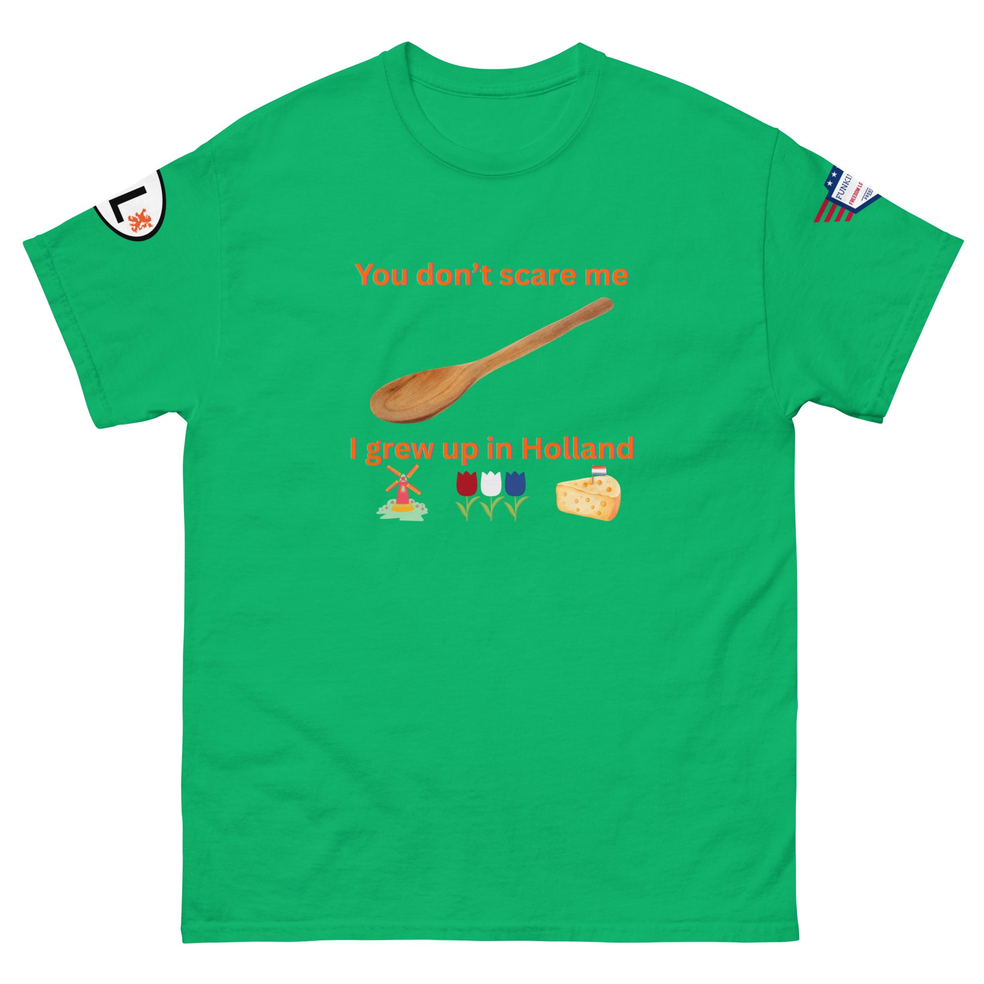 Front view of lime green unisex tee with orange "You don't scare me, I grew up in Holland" print, wooden spoon, windmill/tulip/cheese emojis, sleeve patches