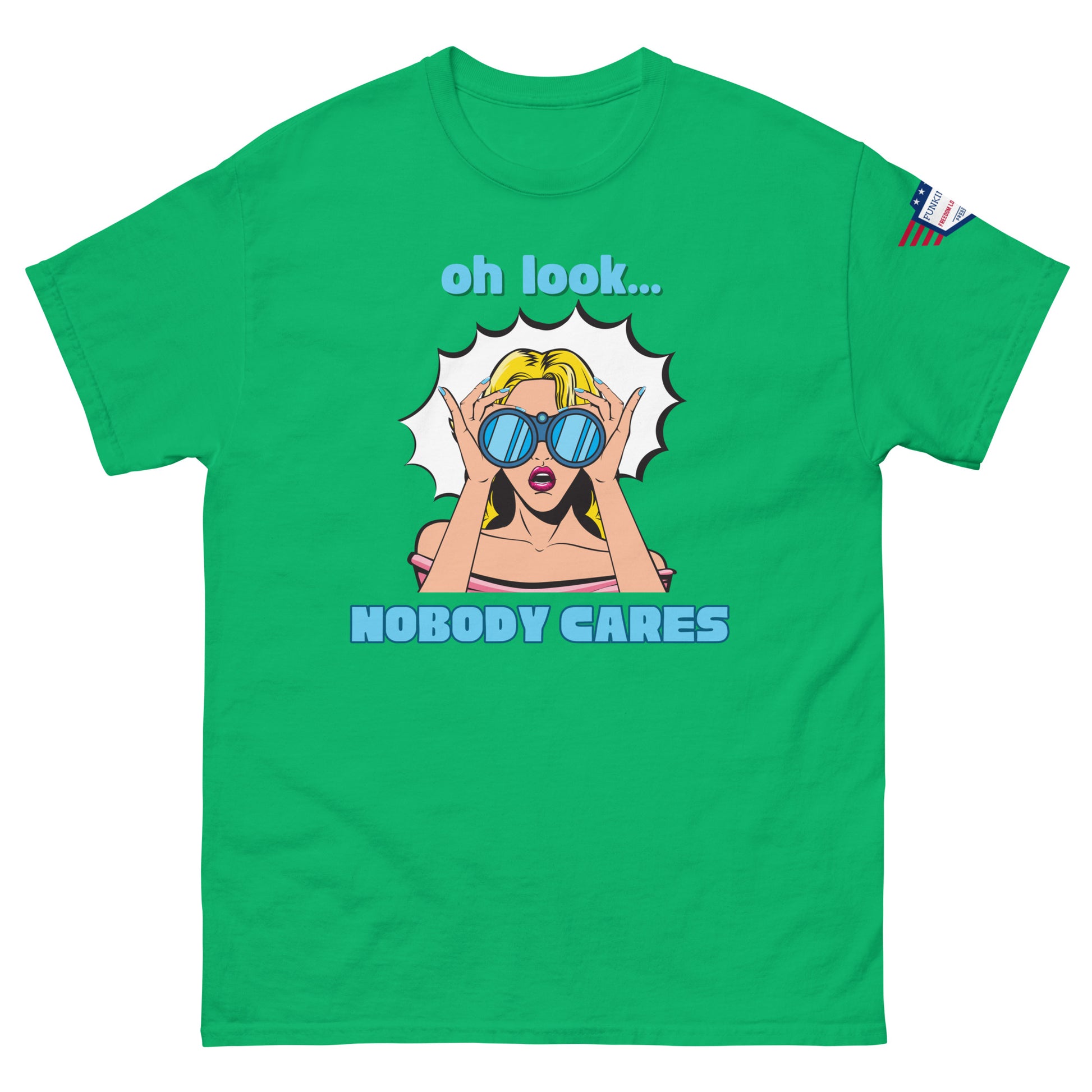 Front view of green unisex t-shirt with cyan "Oh look..." text, pop-art blonde diva in blue shades yelling "NOBODY CARES", USA flag sleeve patch