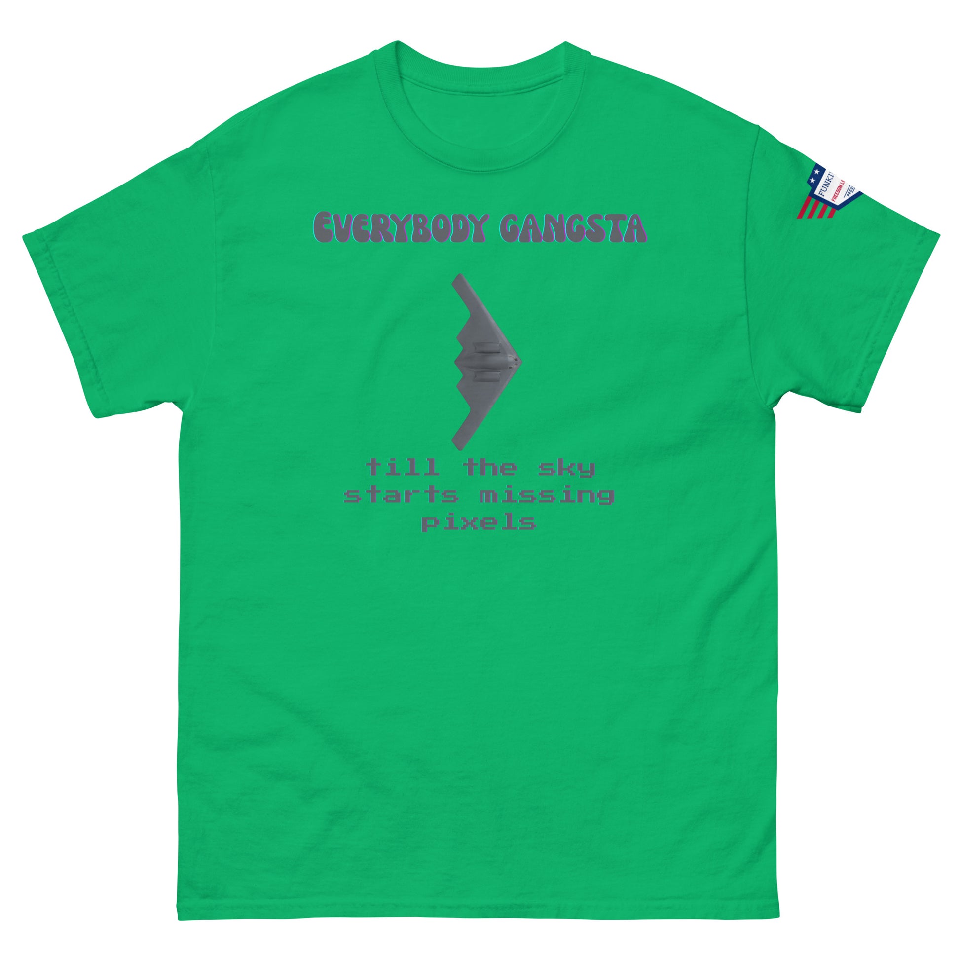 Front view of green unisex tee with purple "Everybody Gangsta" text, gray stealth bomber graphic, teal "till the sky starts missing pixels" glitch print, flag sleeve patch