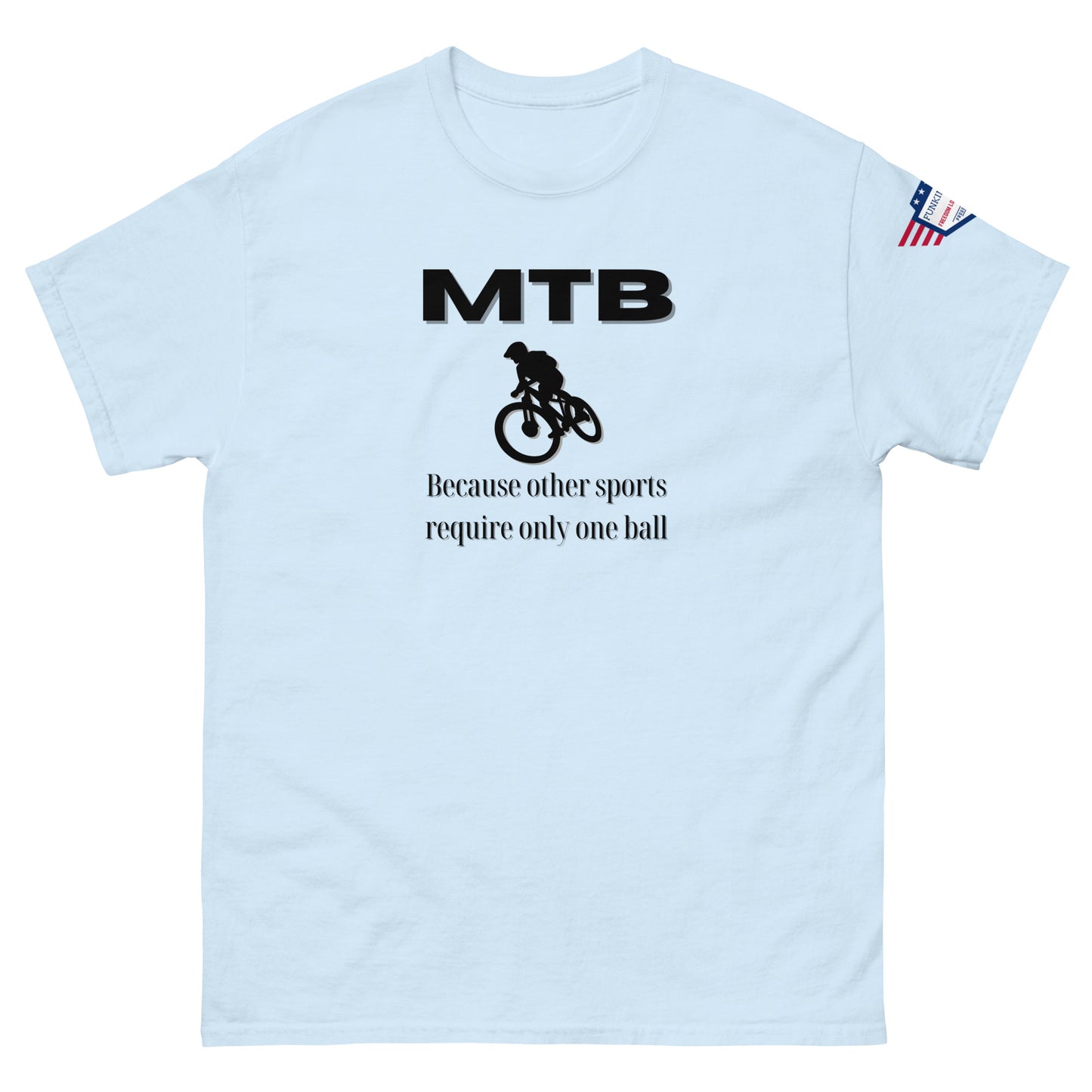 Light blue unisex tee front with black "MTB" print, biker silhouette, "Because other sports require only one ball" — one-ball MTB flex