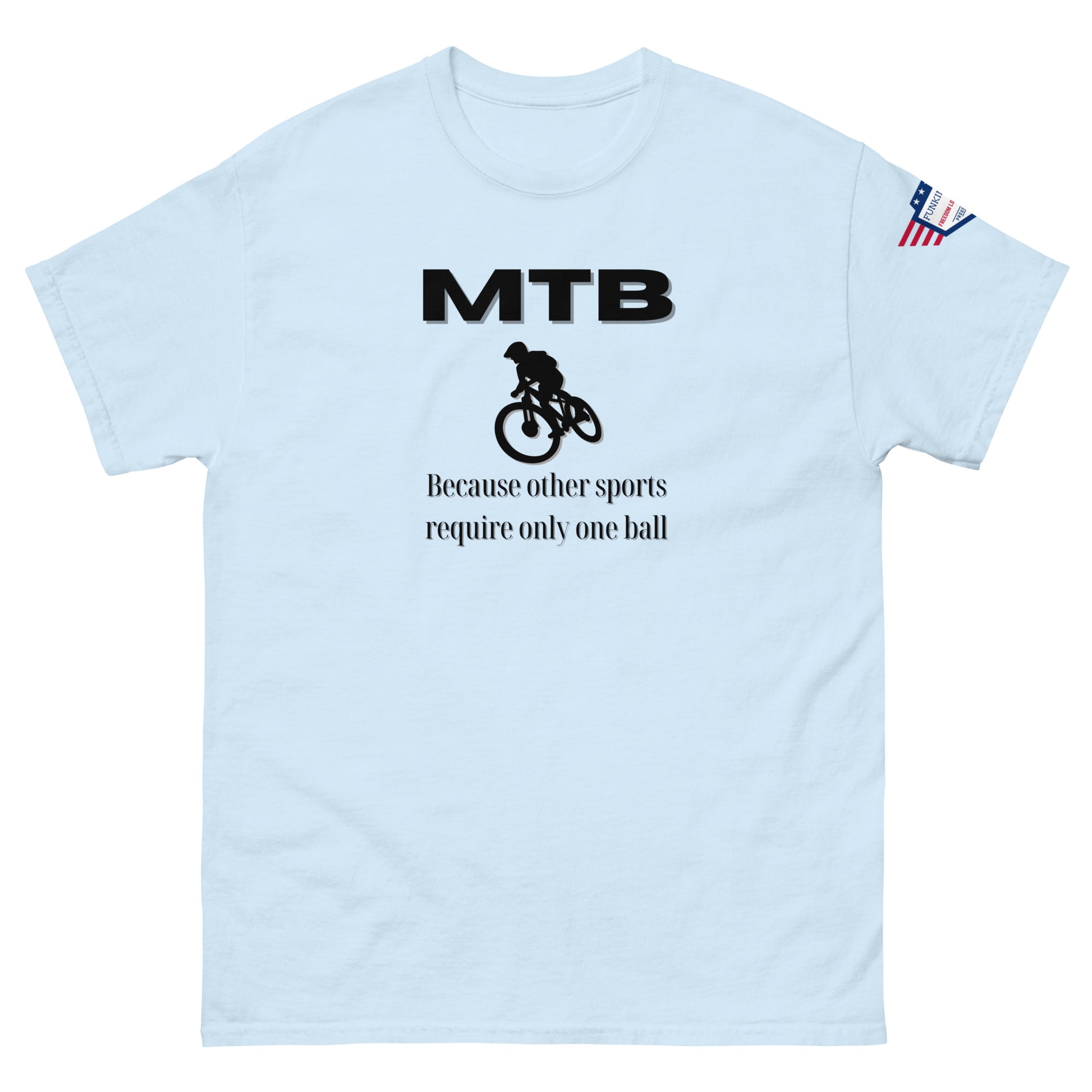 Light blue unisex tee front with black "MTB" print, biker silhouette, "Because other sports require only one ball" — one-ball MTB flex
