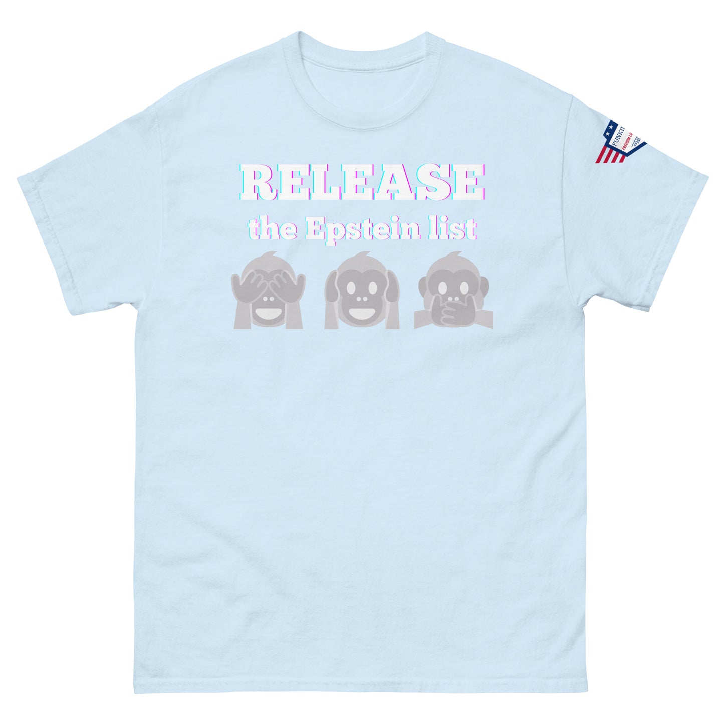 Front view of light blue unisex tee with glowing "RELEASE THE EPSTEIN LIST" print and gray see-no-hear-speak-no-evil monkeys, flag sleeve patch