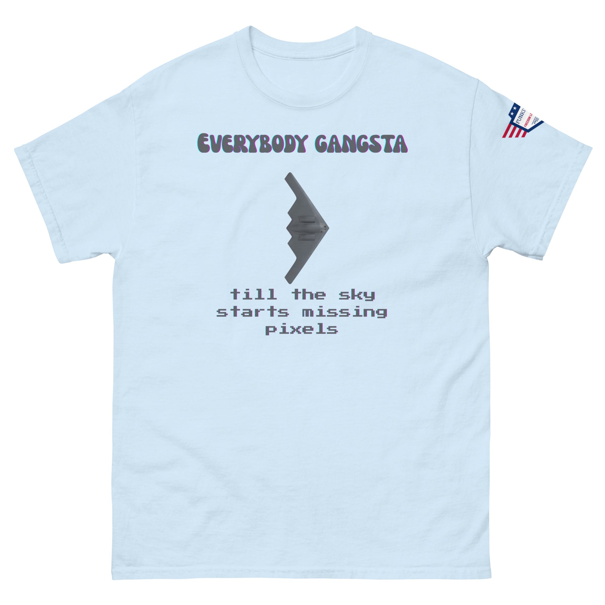 Front view of light blue "Everybody Gangsta till the sky starts missing pixels" tee with gray stealth bomber graphic and US flag sleeve patch