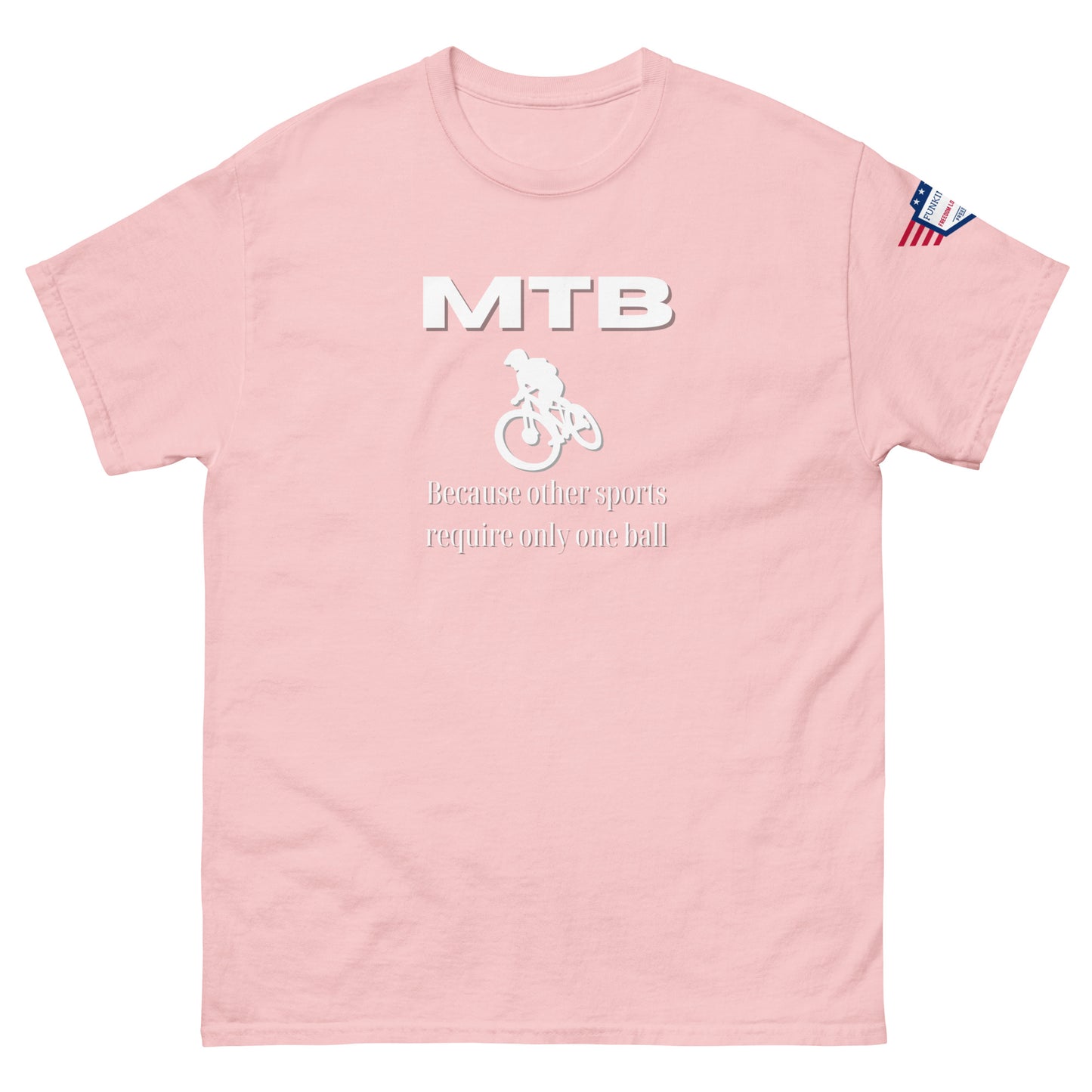 Front view of pink unisex t-shirt featuring white "MTB", jumping biker graphic, "Because other sports require only one ball", flag on sleeve