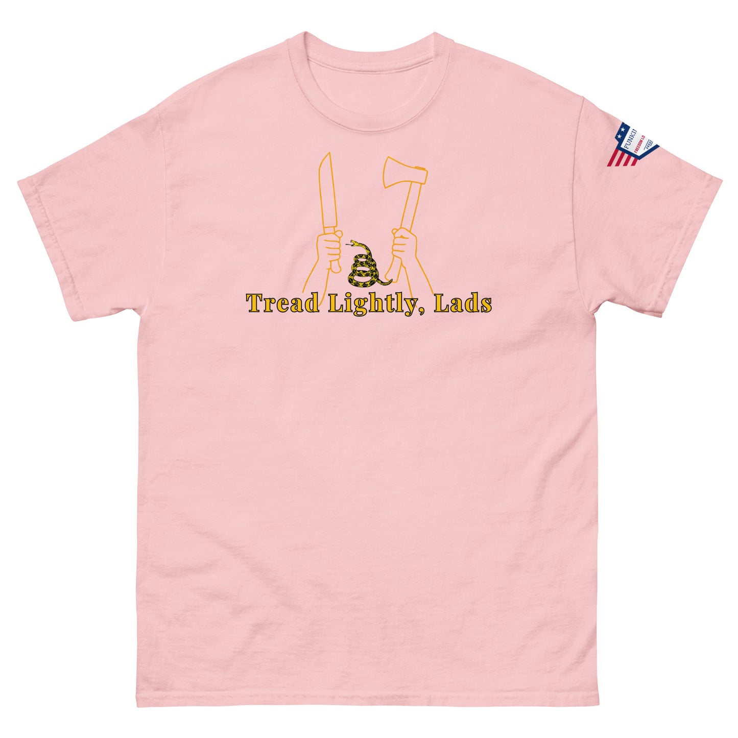 Front view of light pink unisex tee with "Tread Lightly, Lads" yellow print, hands gripping knife & axe flanking Gadsden snake, flag sleeve patch