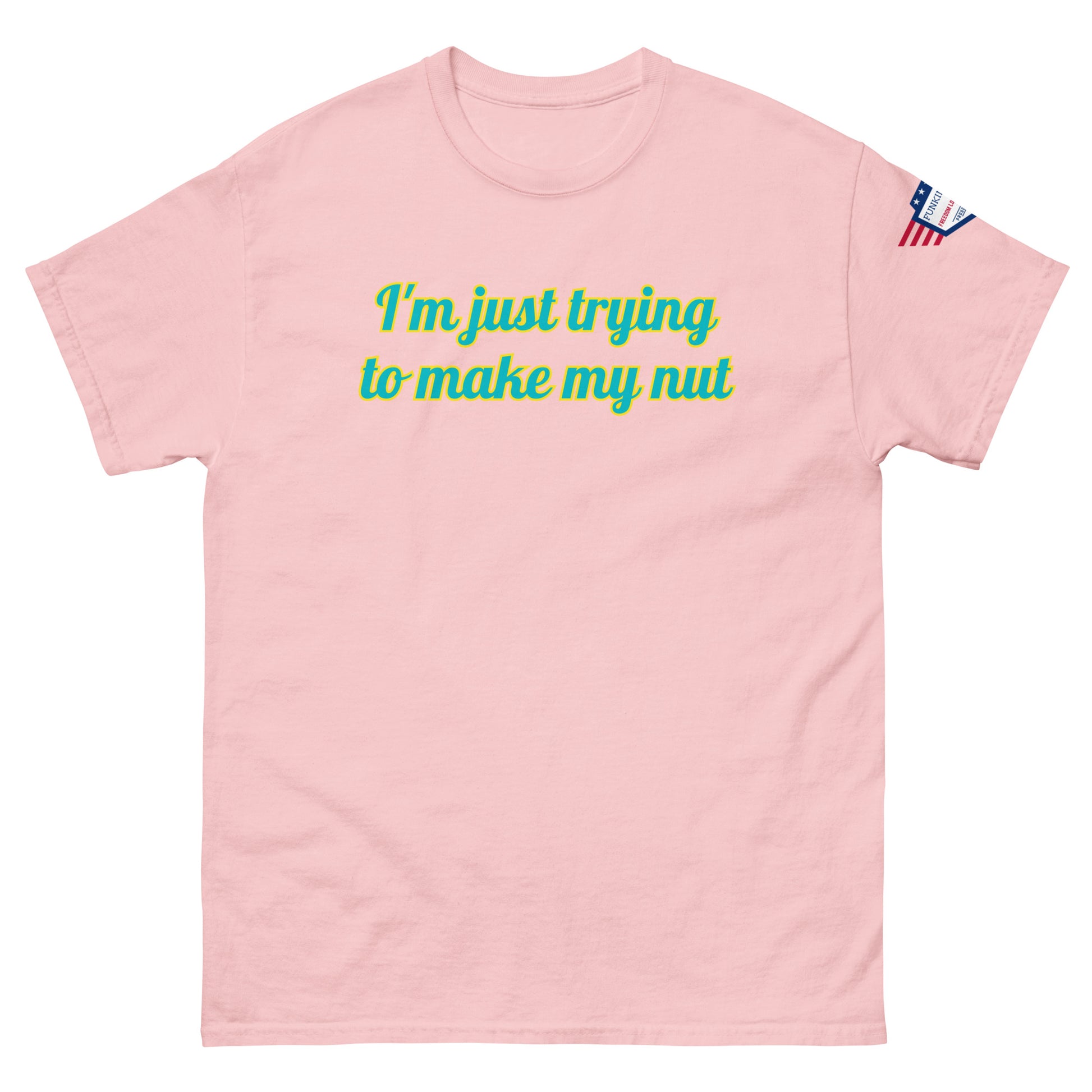 Front view of light pink tee with "I'm just trying to make my nut" in teal script and US flag sleeve patch