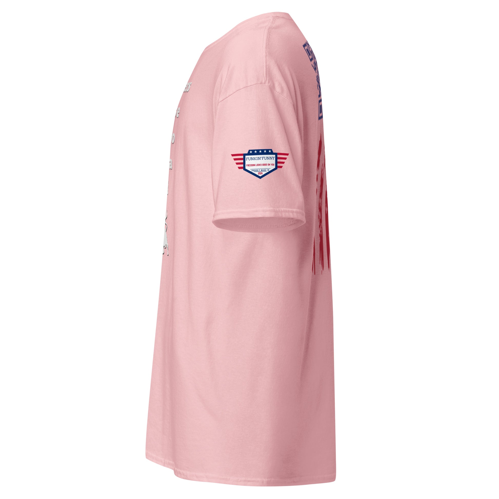 Right side view of light pink tee showing partial front text, sleeve flag patch, and red flag stripes