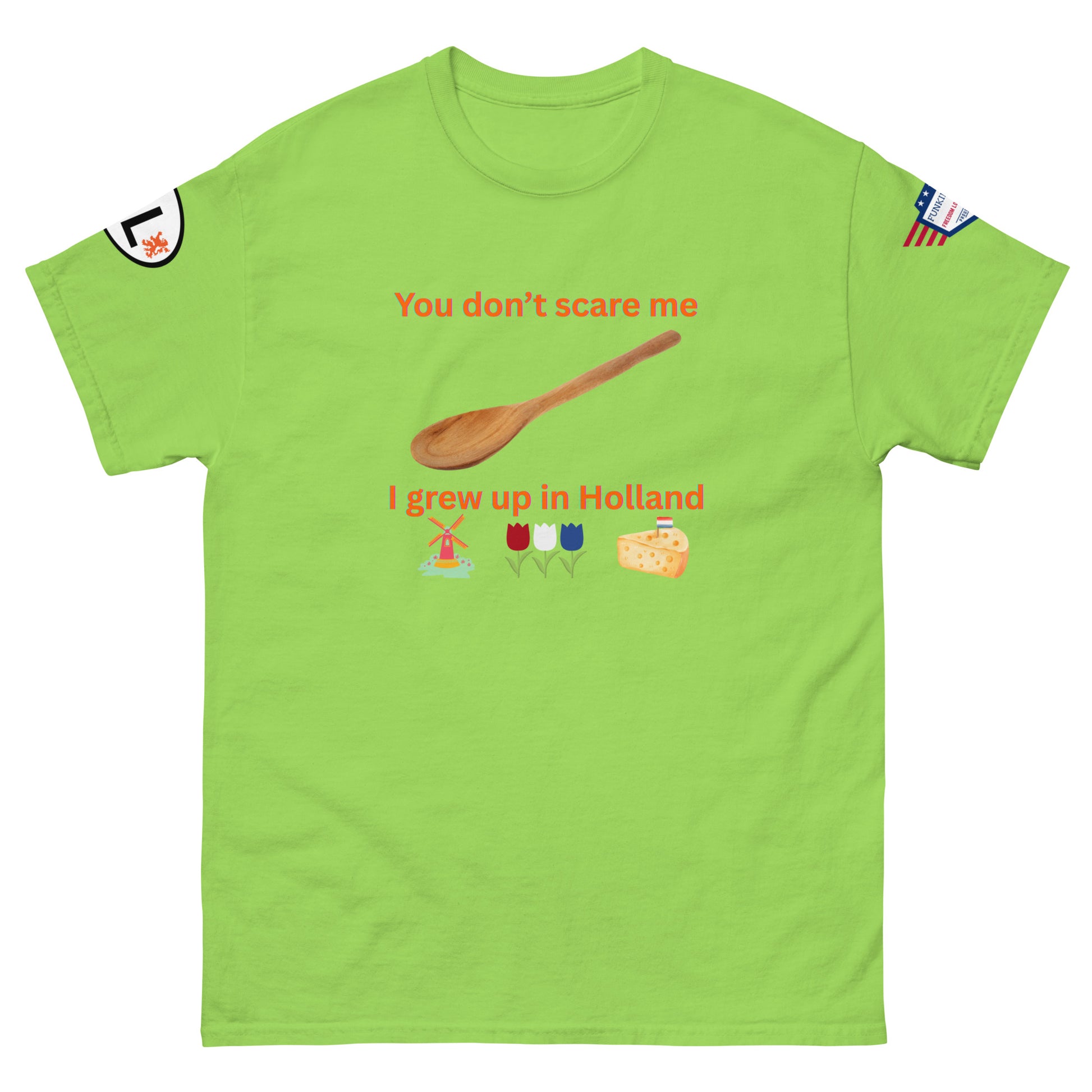 Front view of lime green tee with bold orange "You don't scare me, I grew up in Holland", spoon, windmill, tulips & cheese icons
