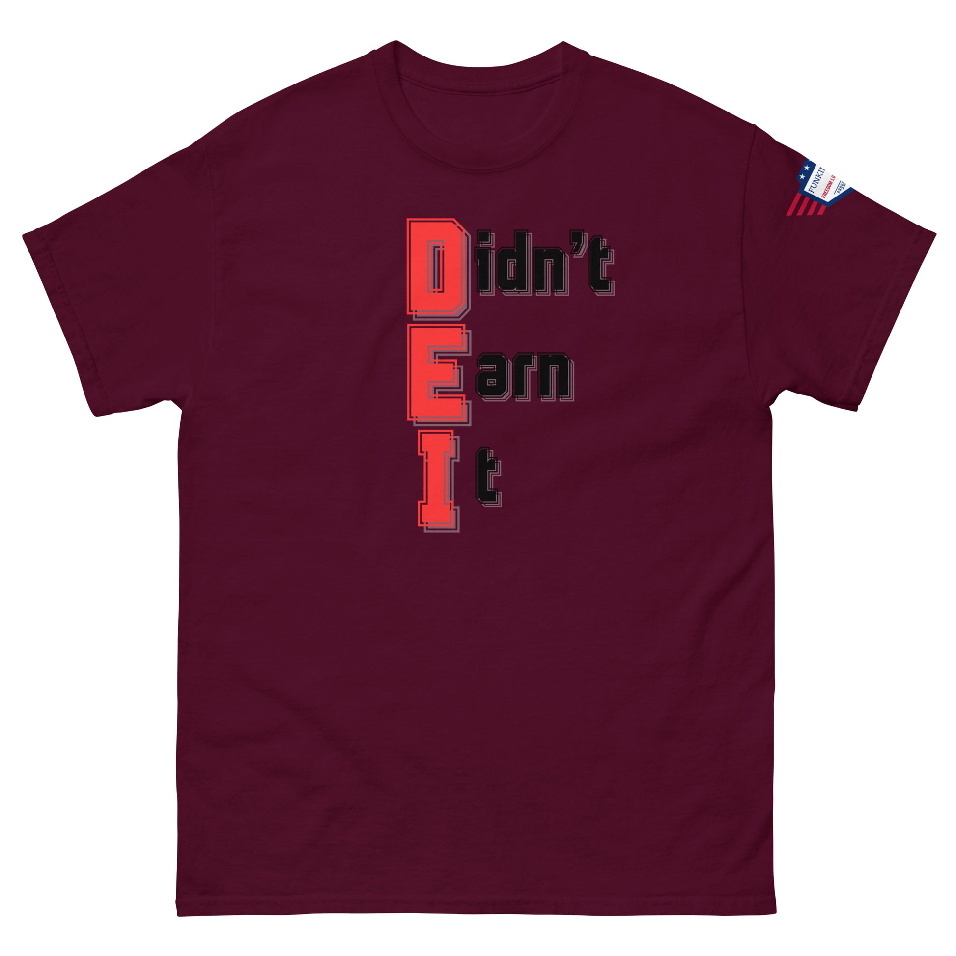 Front view of maroon unisex t-shirt with "Didn't Earn It" stacked red-black print, small US flag sleeve patch