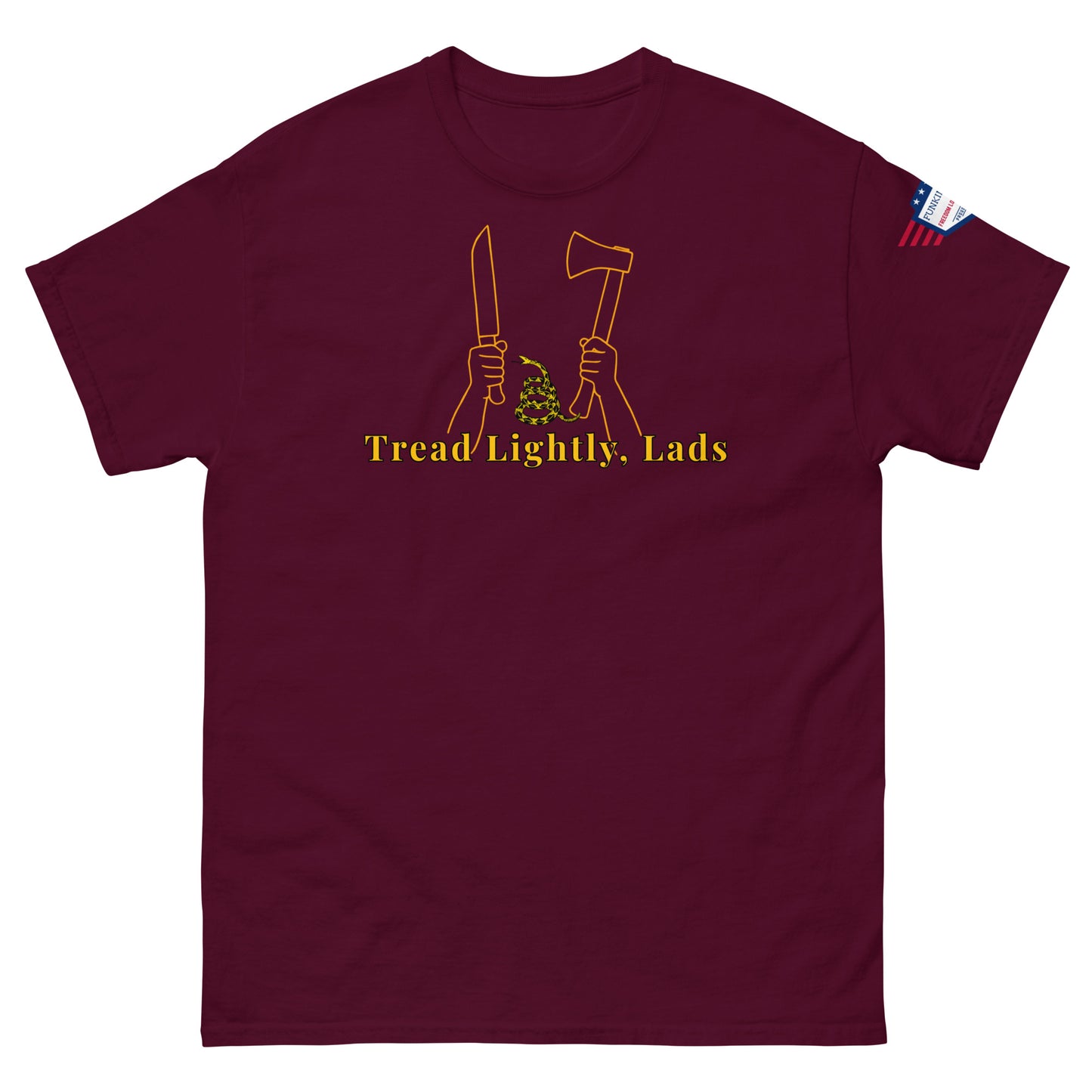 Front view of maroon unisex tee with bold yellow "Tread Lightly, Lads" print, knife-axe hands & snake design, American flag sleeve patch
