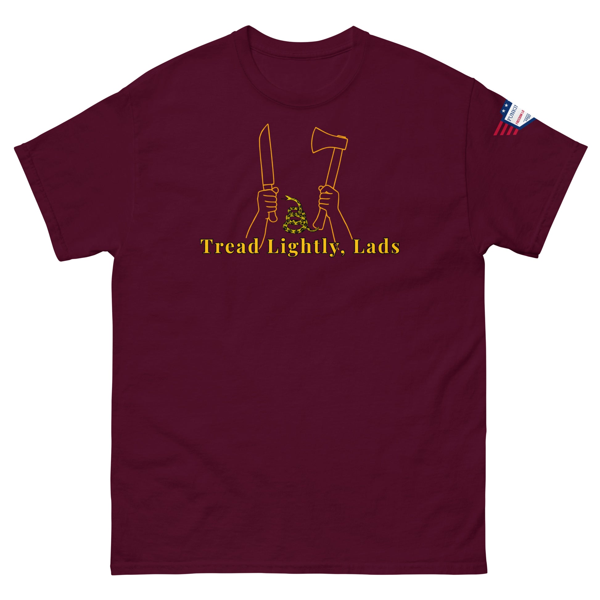 Front view of maroon unisex tee with bold yellow "Tread Lightly, Lads" print, knife-axe hands & snake design, American flag sleeve patch