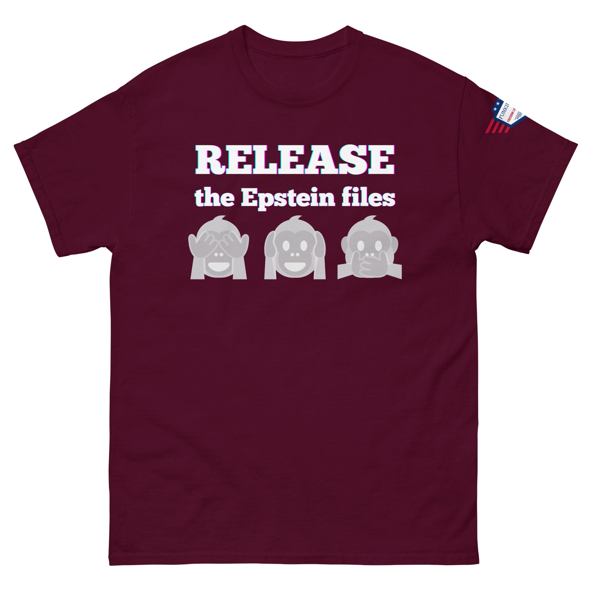 Front view of maroon t-shirt with "RELEASEASE the Epstein files" gradient text and gray see-no-evil monkeys, US flag sleeve patch