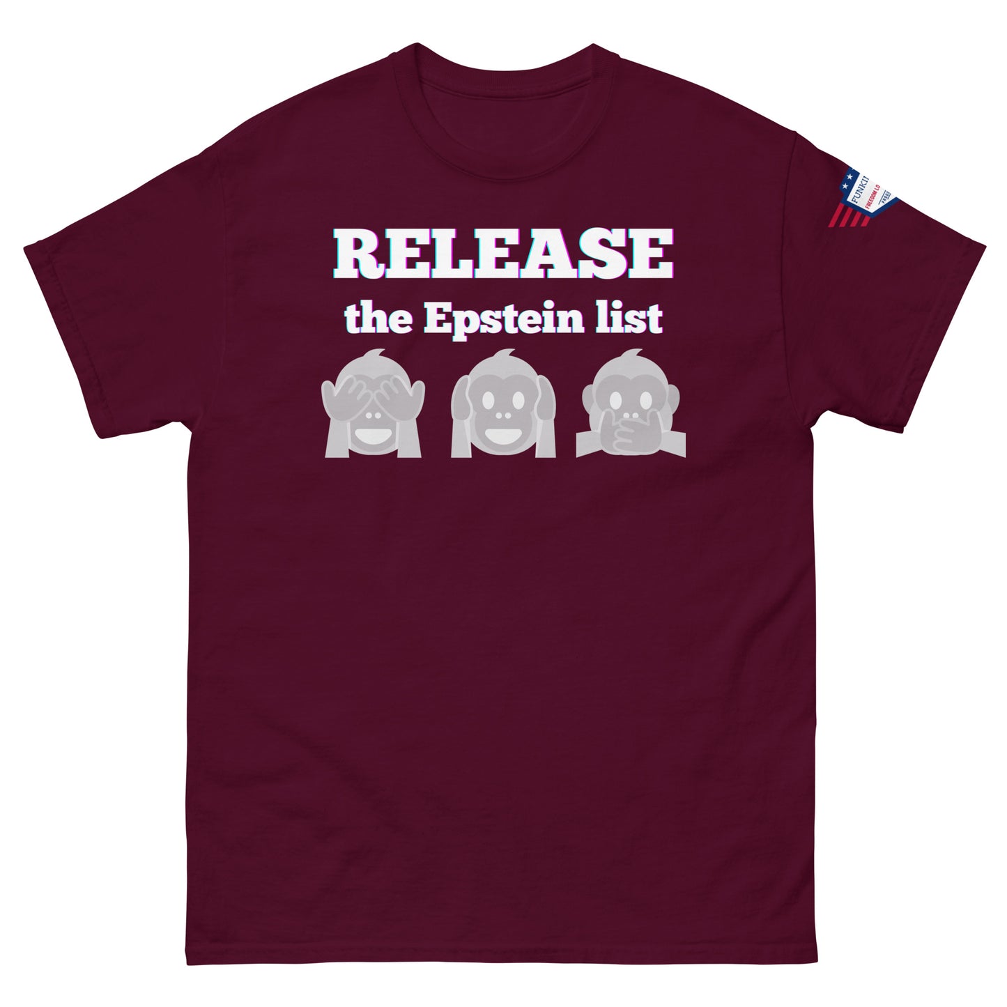 Front view of maroon unisex tee with glowing "RELEASE THE EPSTEIN LIST" print and gray see-no-hear-speak-no-evil monkeys, flag sleeve patch