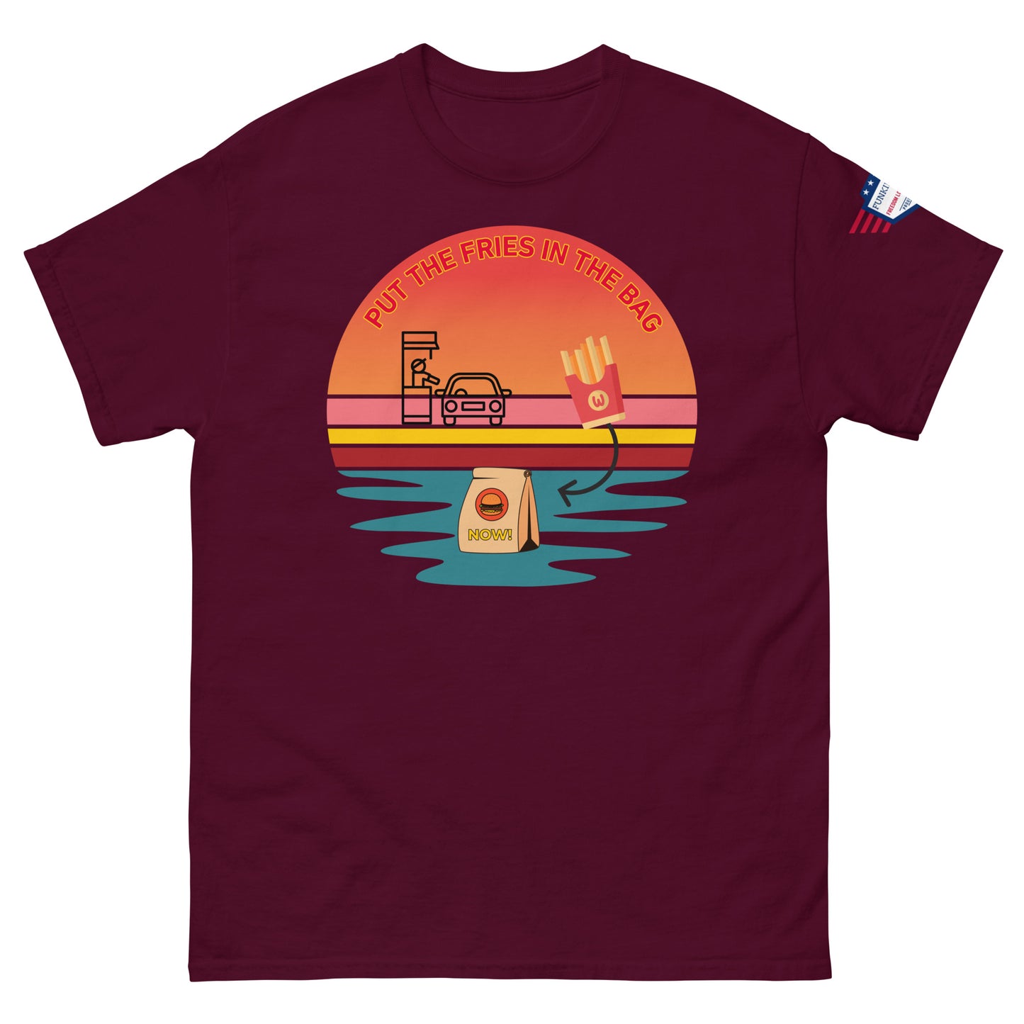 Front view of maroon unisex tee featuring "PUT THE FRIES IN THE BAG" retro drive-thru sunset meme with flag sleeve patch