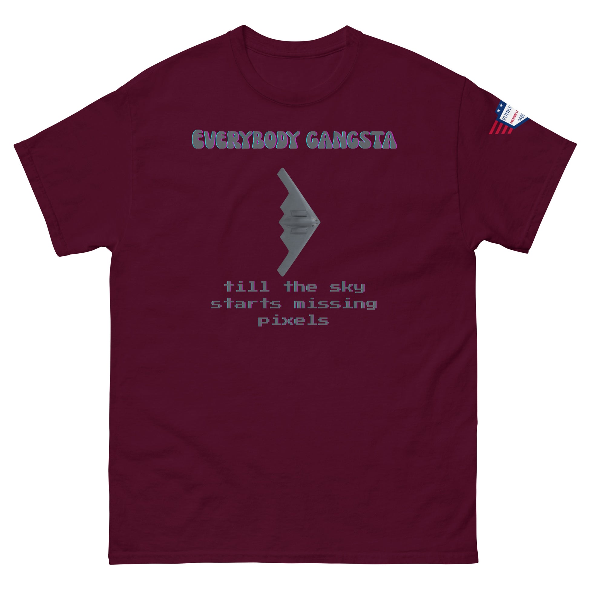 Front view of maroon "Everybody Gangsta till the sky starts missing pixels" tee with bomber graphic and US flag on right sleeve