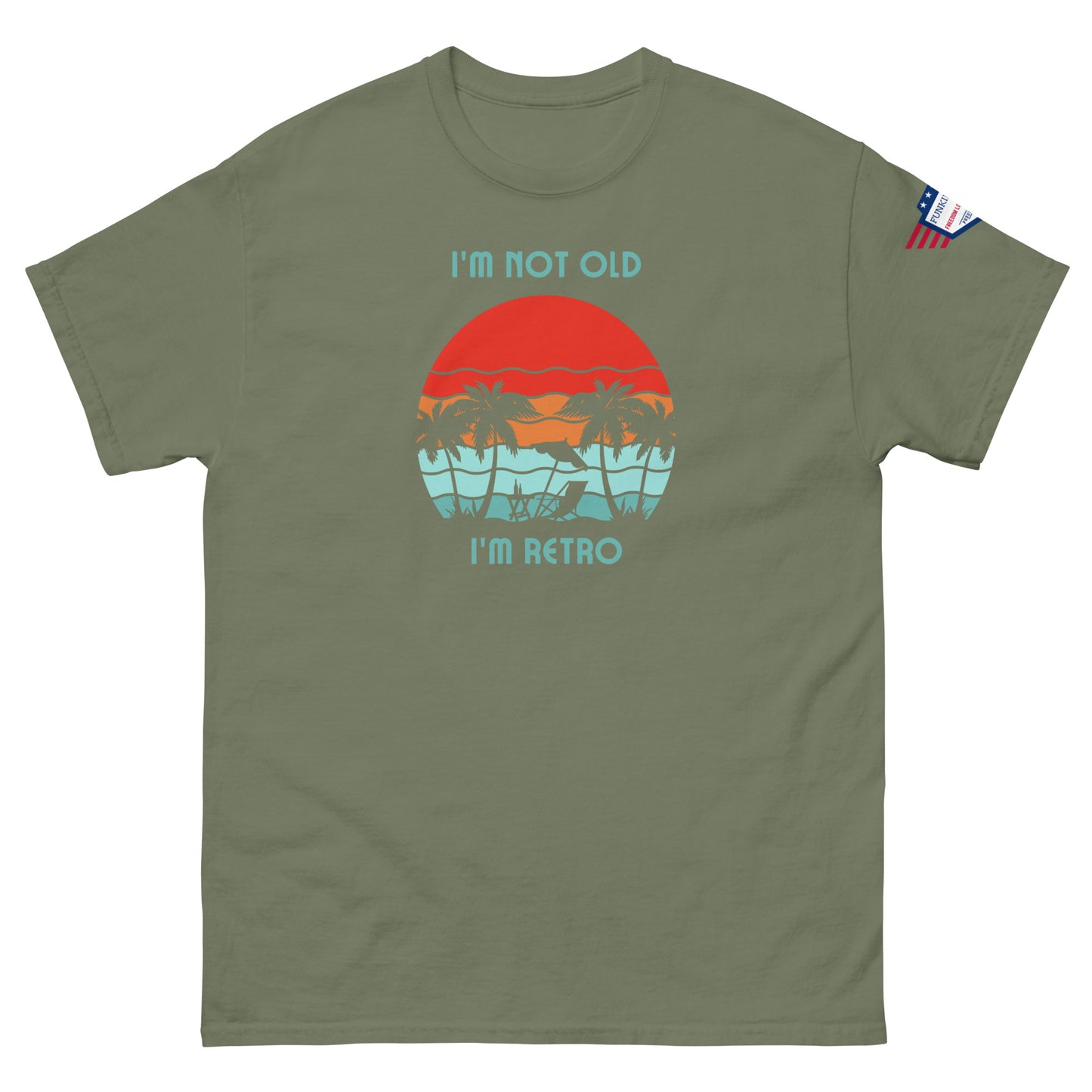 Front view of olive green "I'm Not Old I'm Retro" unisex t-shirt with hammock sunset graphic and flag