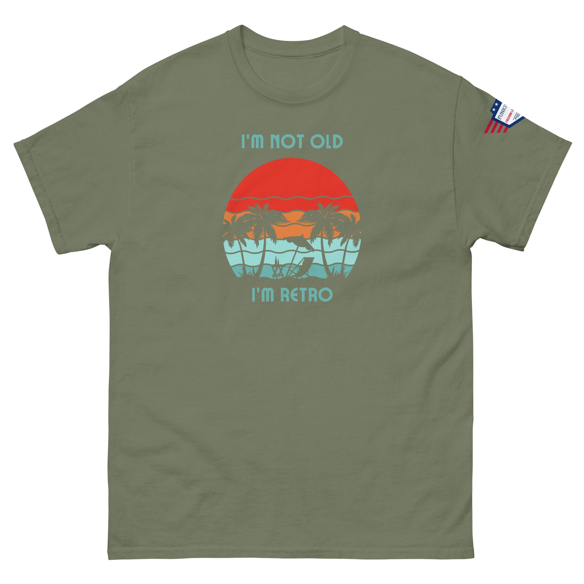 Front view of olive green "I'm Not Old I'm Retro" unisex t-shirt with hammock sunset graphic and flag