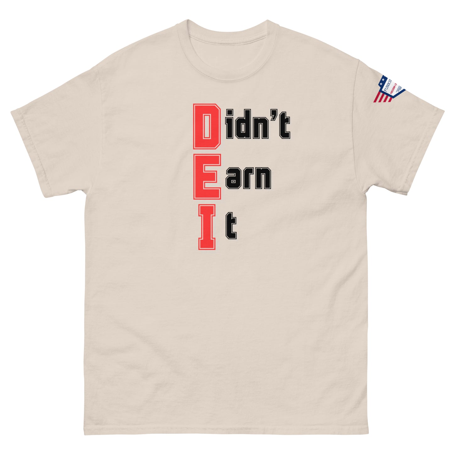 Front view of light beige unisex t-shirt with "Didn't Earn It" graphic in red and black, US flag on right sleeve