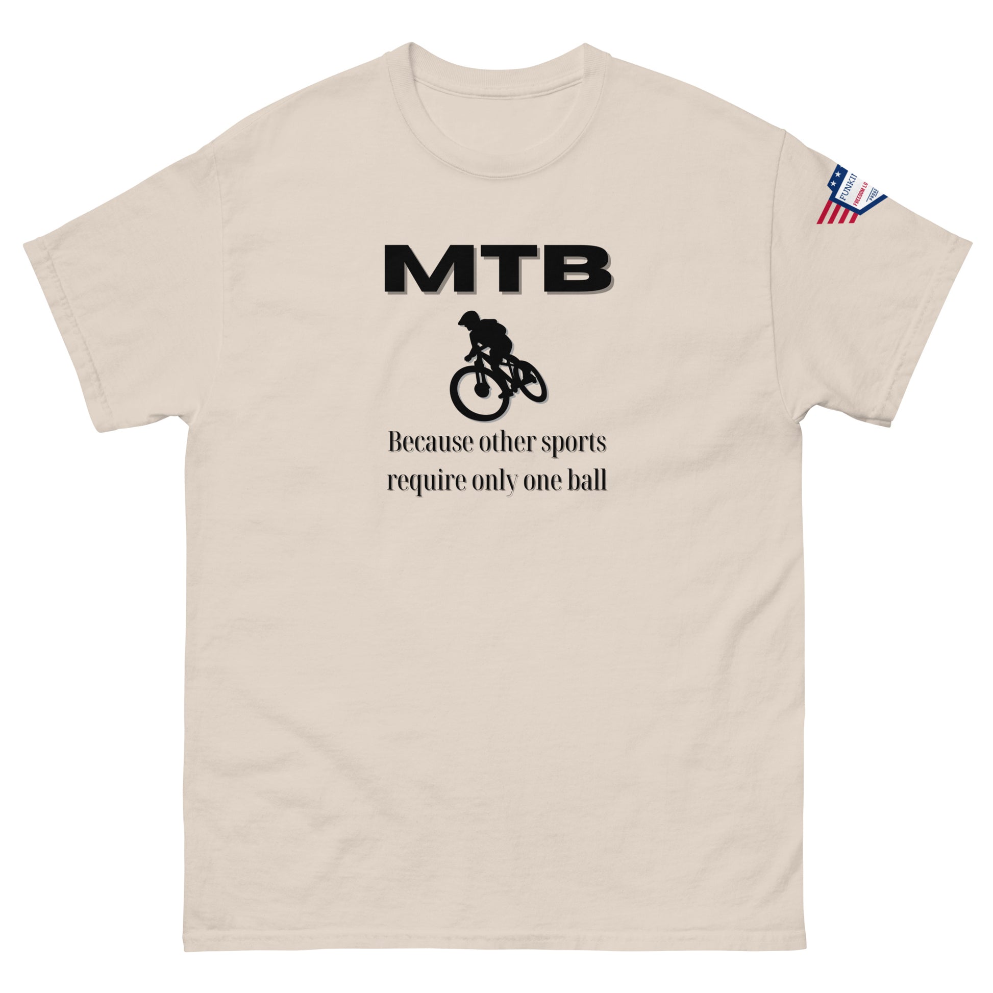 Beige unisex tee front showing black "MTB", bike graphic, "Because other sports require only one ball" burn