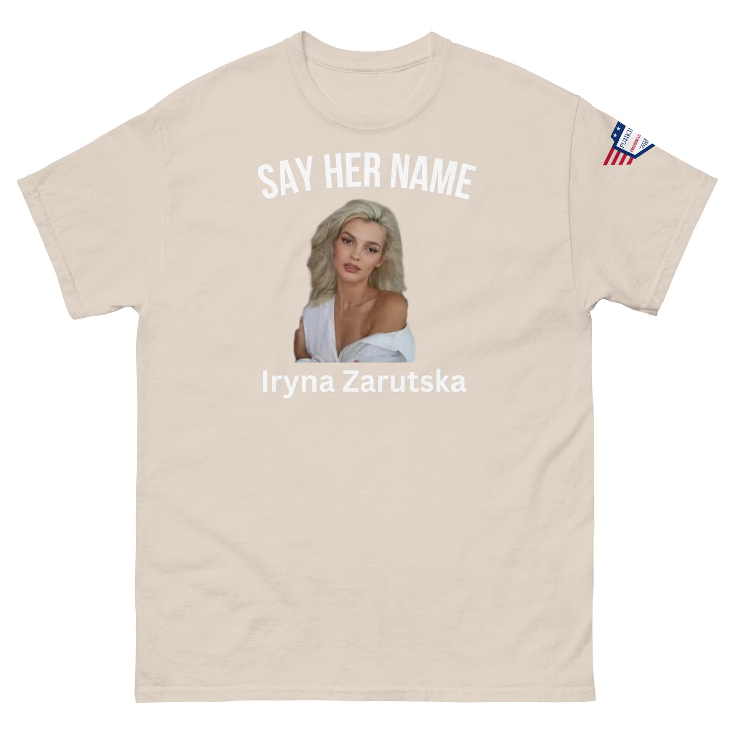Front view of ash gray unisex tee with "SAY HER NAME" top text, Iryna Zarzutska portrait center, name bottom, US flag patch