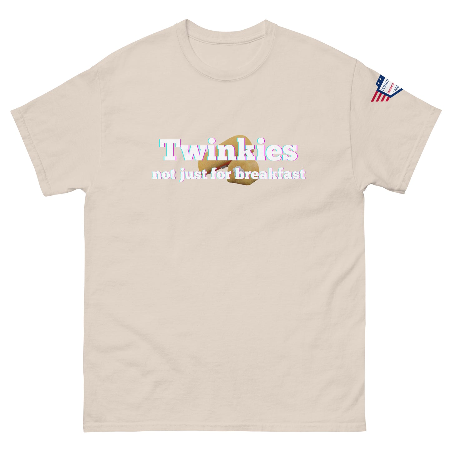 Front view of beige unisex tee displaying "Twinkies not just for breakfast" and Twinkie graphic, American flag on sleeve