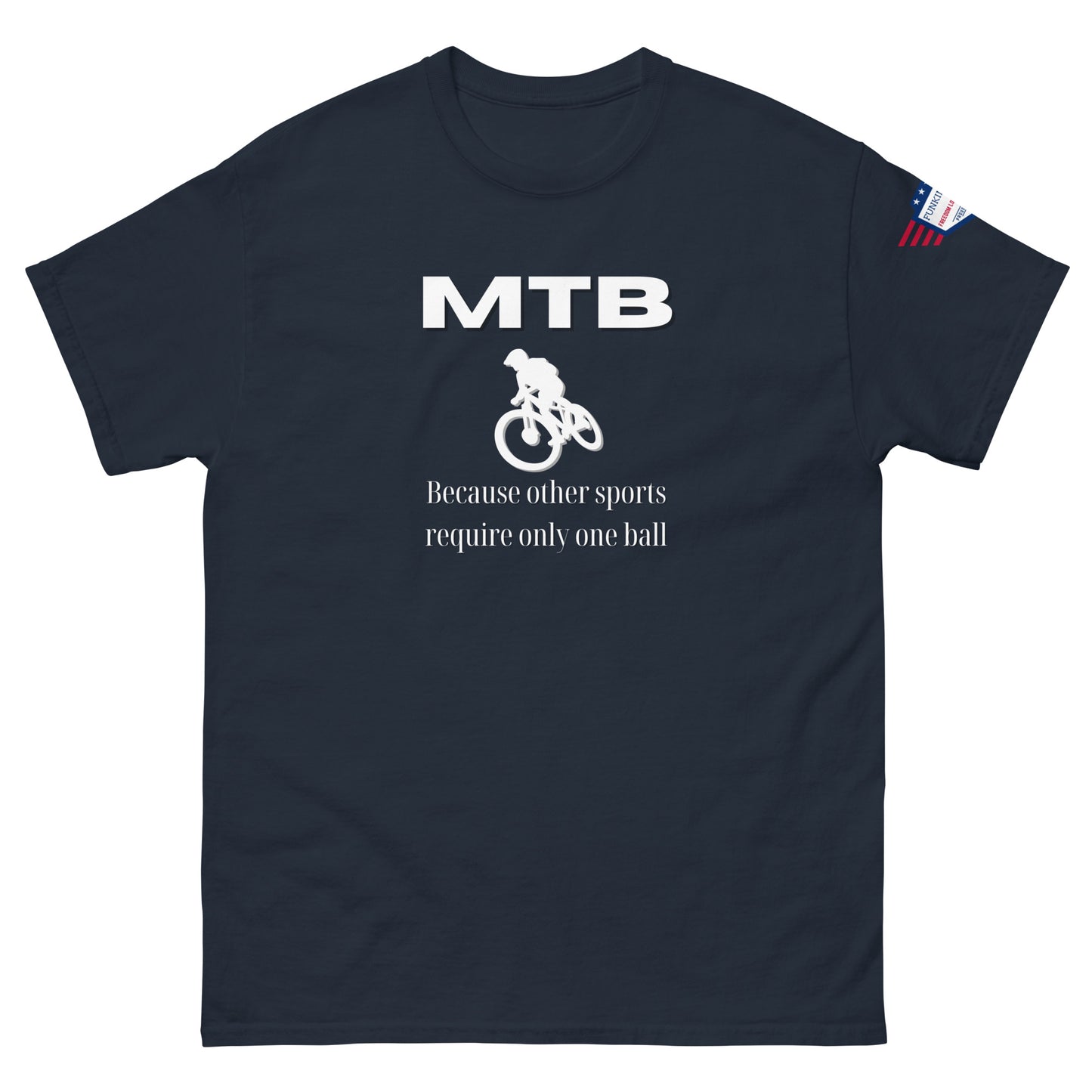 Front view of navy blue tee boasting white "MTB", biker jump graphic, "Because other sports require only one ball", US flag patch