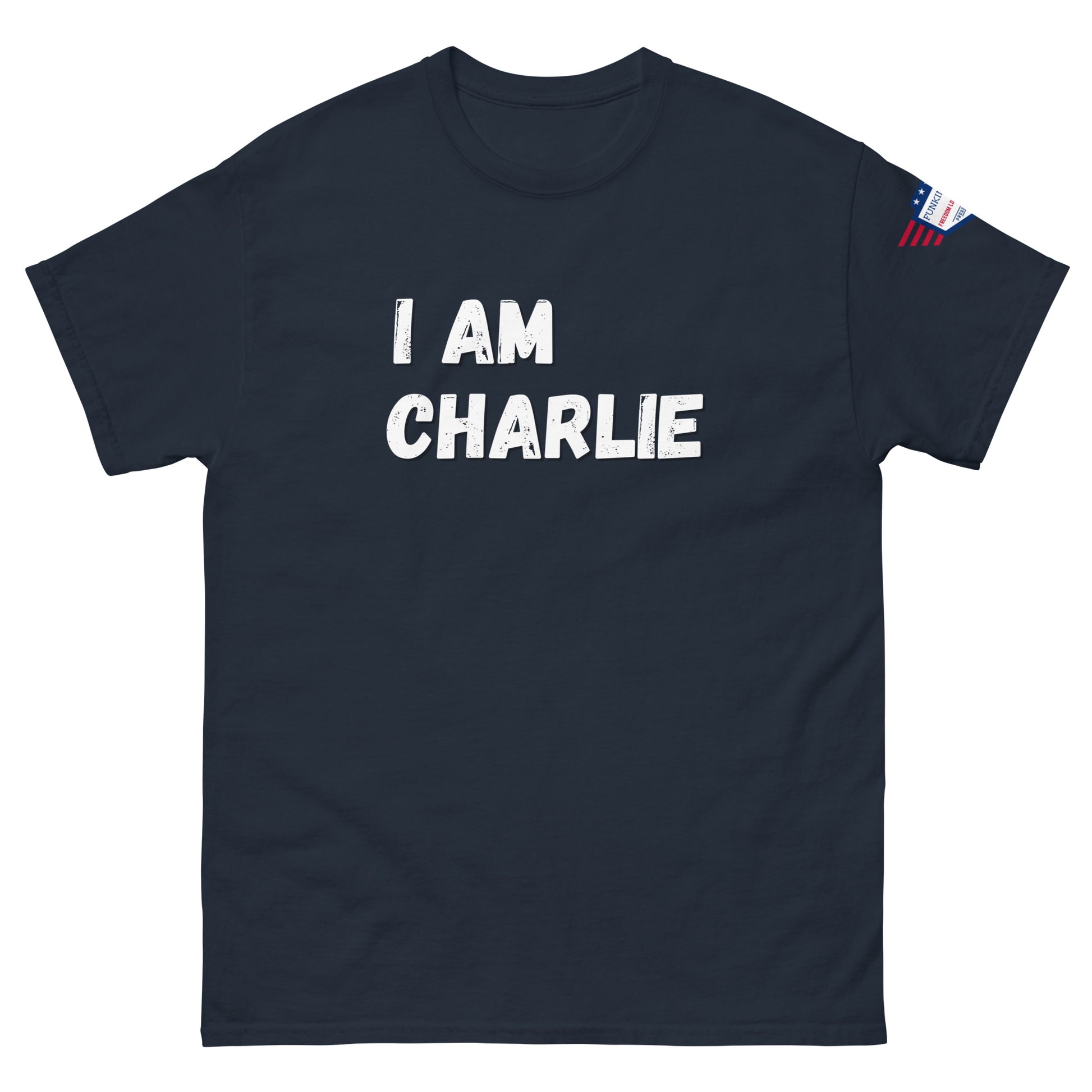 Black tee front view, crisp white "I AM CHARLIE" graphic, flag sleeve patch