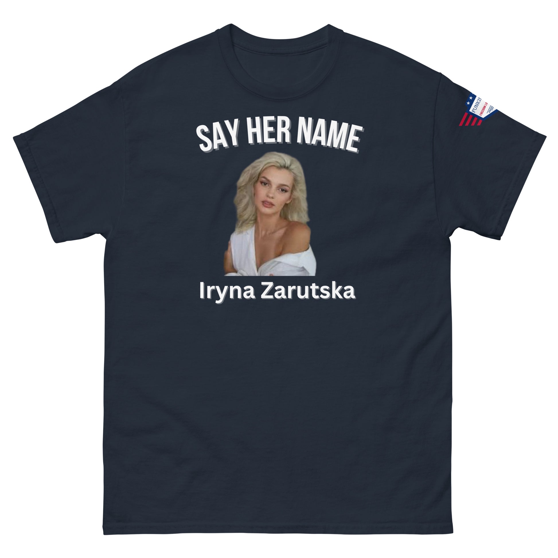 Front view of navy blue funny tee: arched "SAY HER NAME", glamorous Iryna Zarzutska image, her name, flag on right sleeve