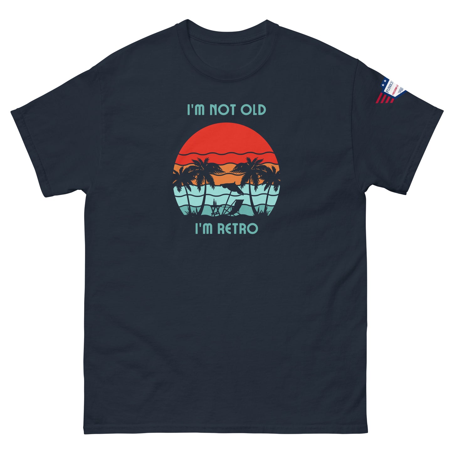 Front view of navy "I'm Not Old I'm Retro" t-shirt boasting retro beach graphic and flag detail