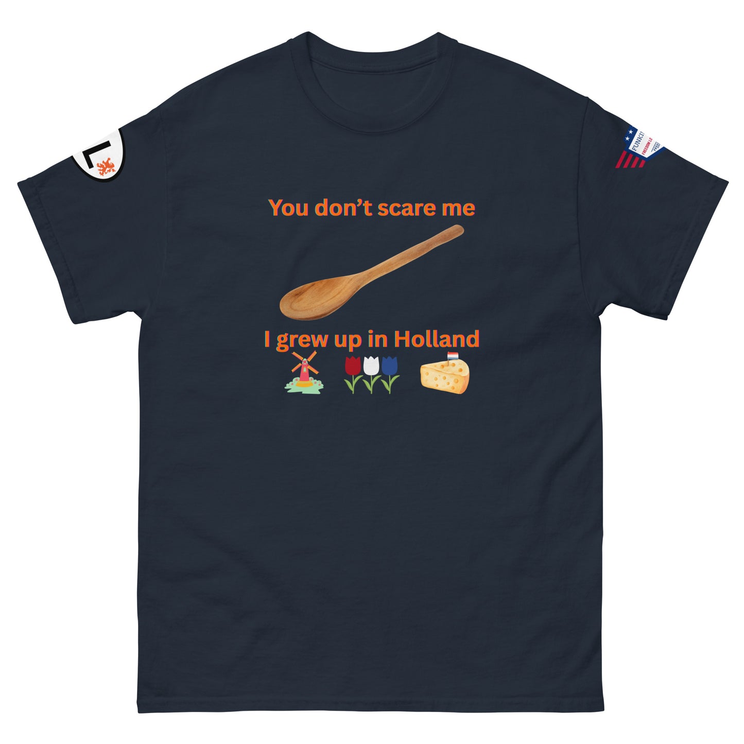 Front view of navy blue tee boasting "You don't scare me, I grew up in Holland" orange print, spoon, windmill, tulips, cheese