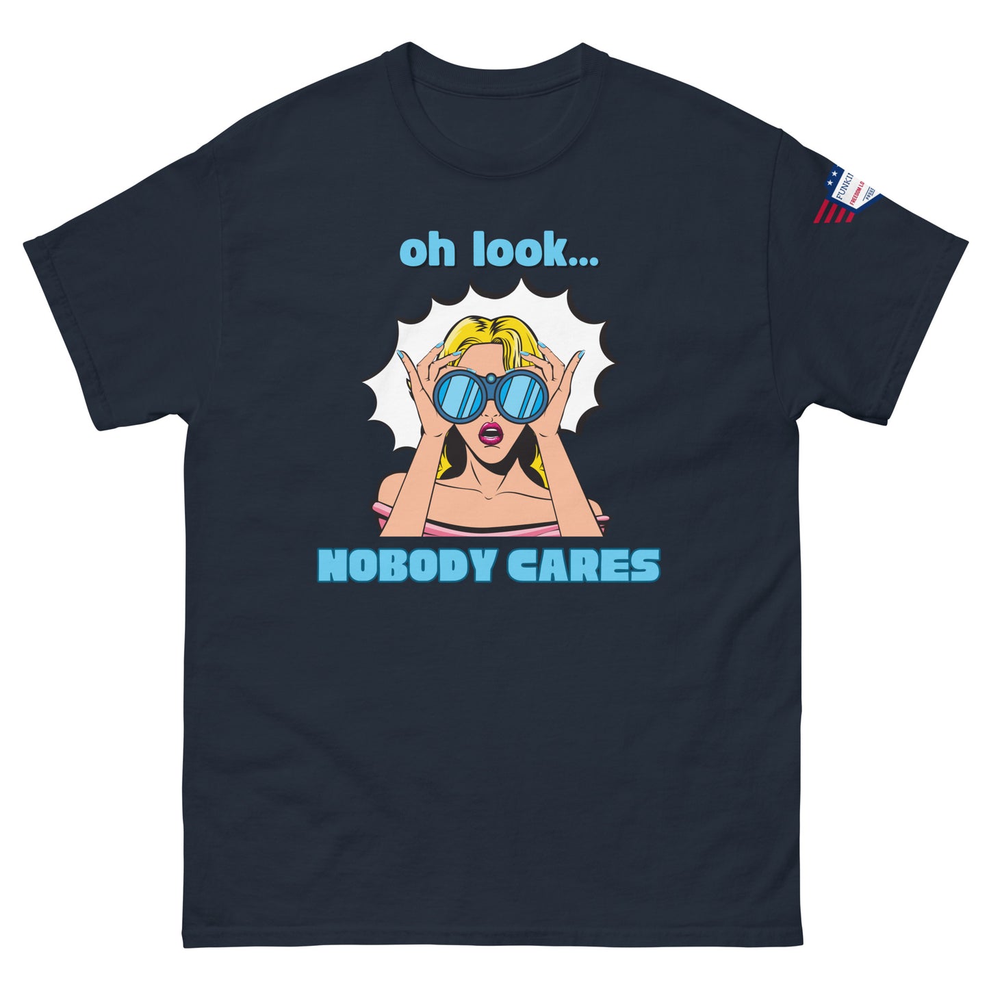 Front view of navy blue unisex t-shirt with pop-art "oh look... NOBODY CARES" blonde eyeing you, USA sleeve flag