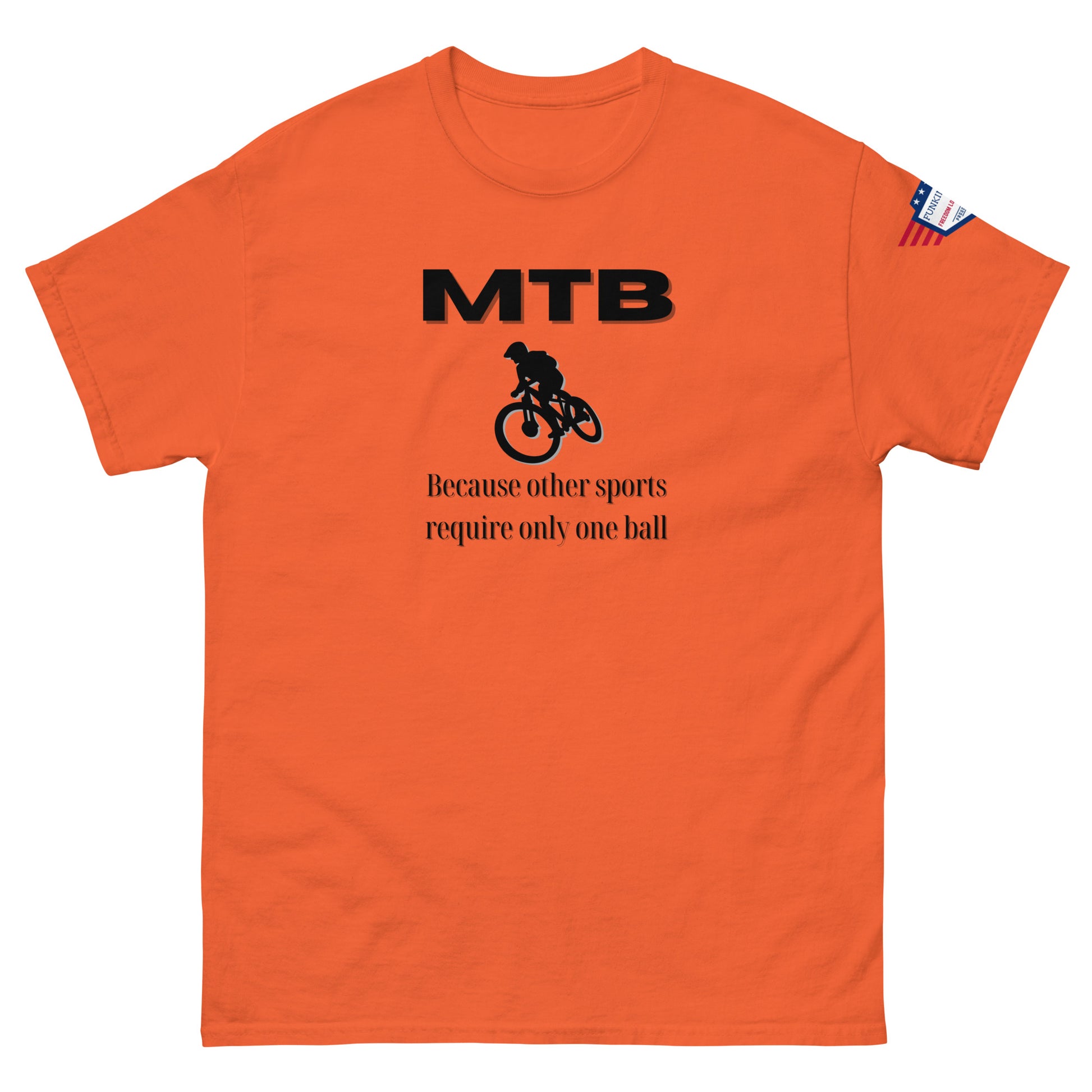 Orange unisex tee front: black "MTB" header, MTB biker, "Because other sports require only one ball"
