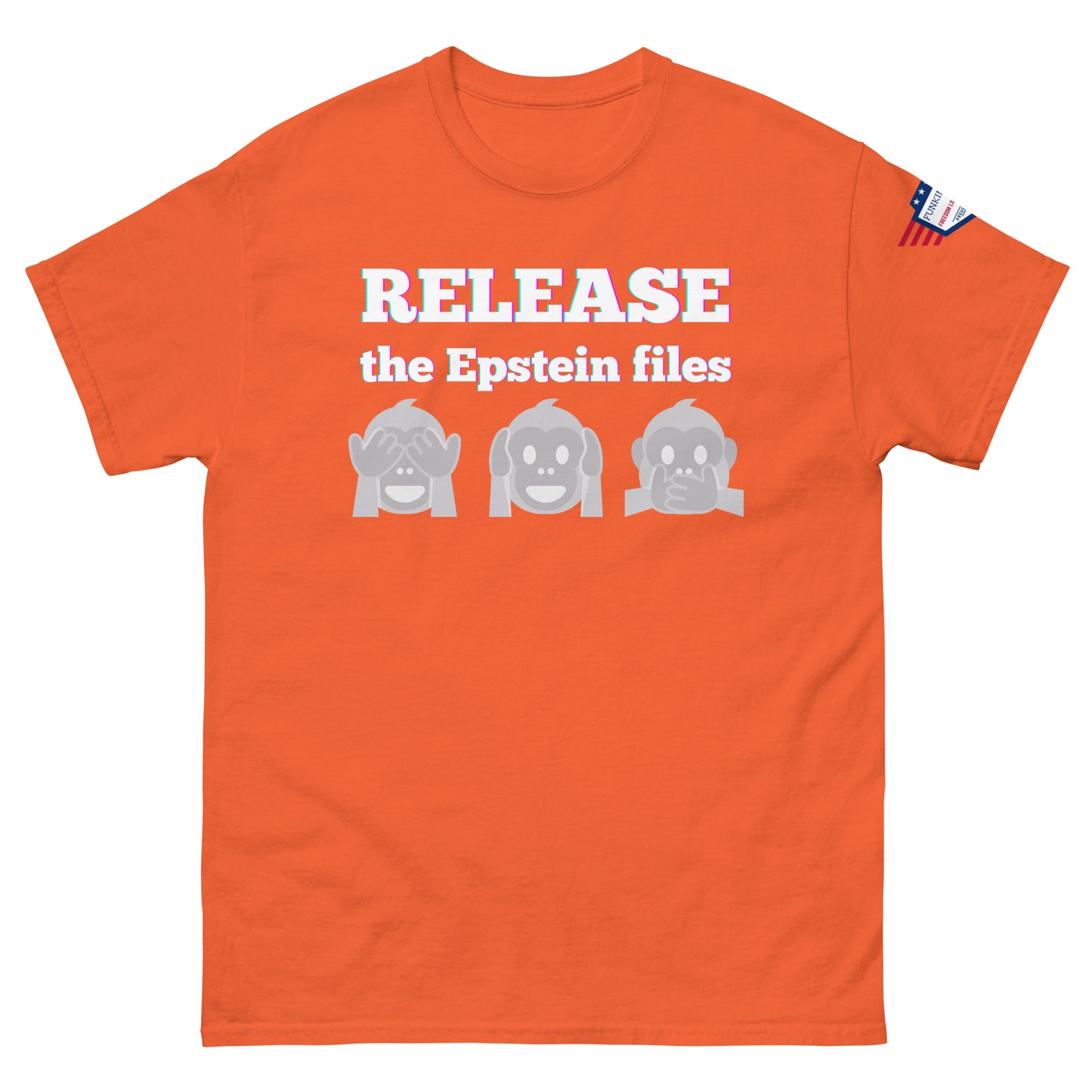 Front view of orange t-shirt with "RELEASEASE the Epstein files" gradient text and gray see-no-evil monkeys, US flag sleeve patch