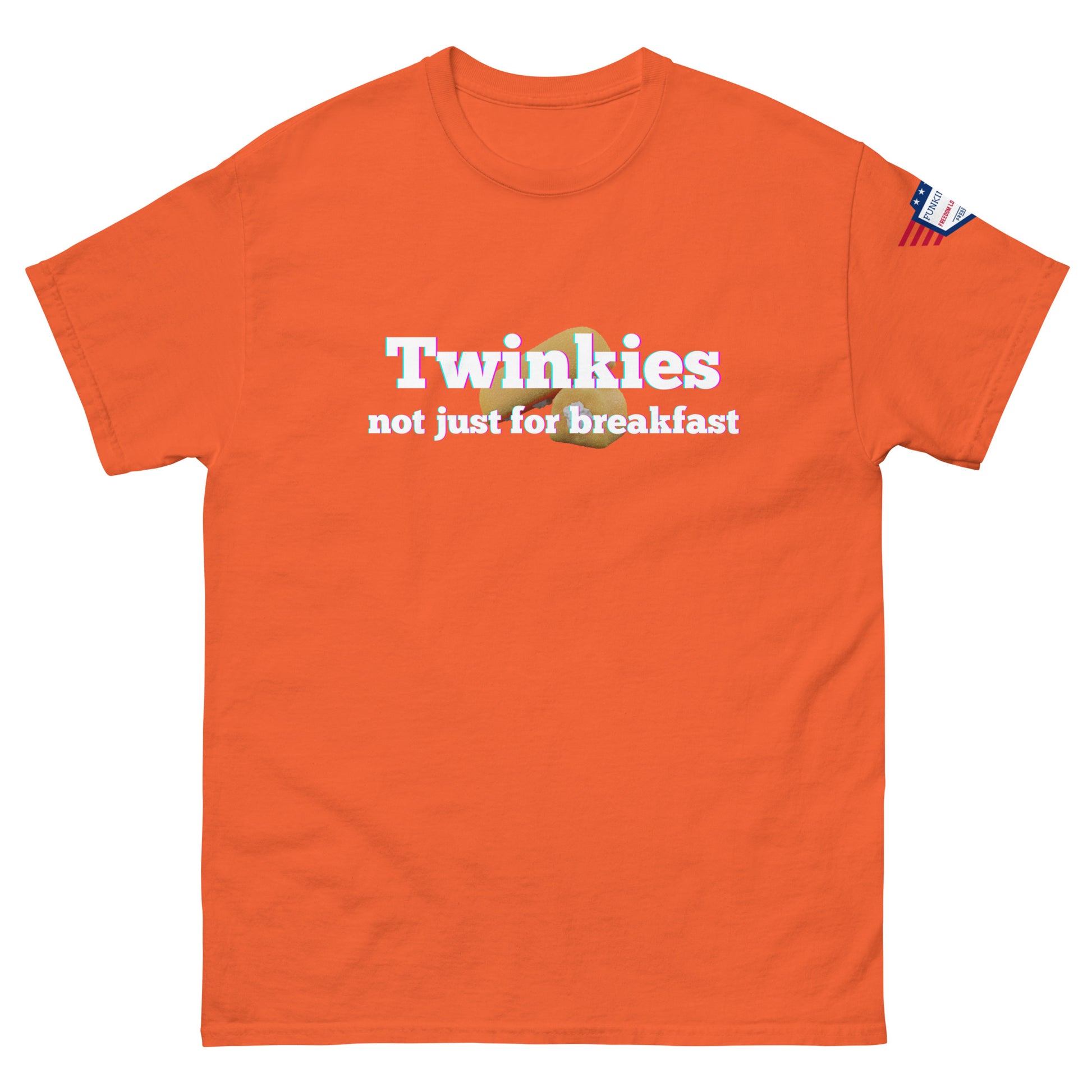 Front view of orange unisex tee boasting "Twinkies not just for breakfast" design with Twinkie, flag on right sleeve