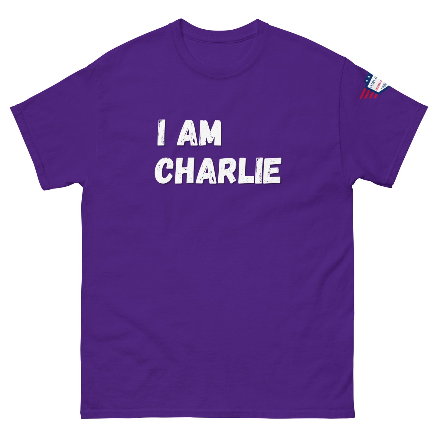 Purple tee front with distressed white "I AM CHARLIE", stars-and-stripes sleeve