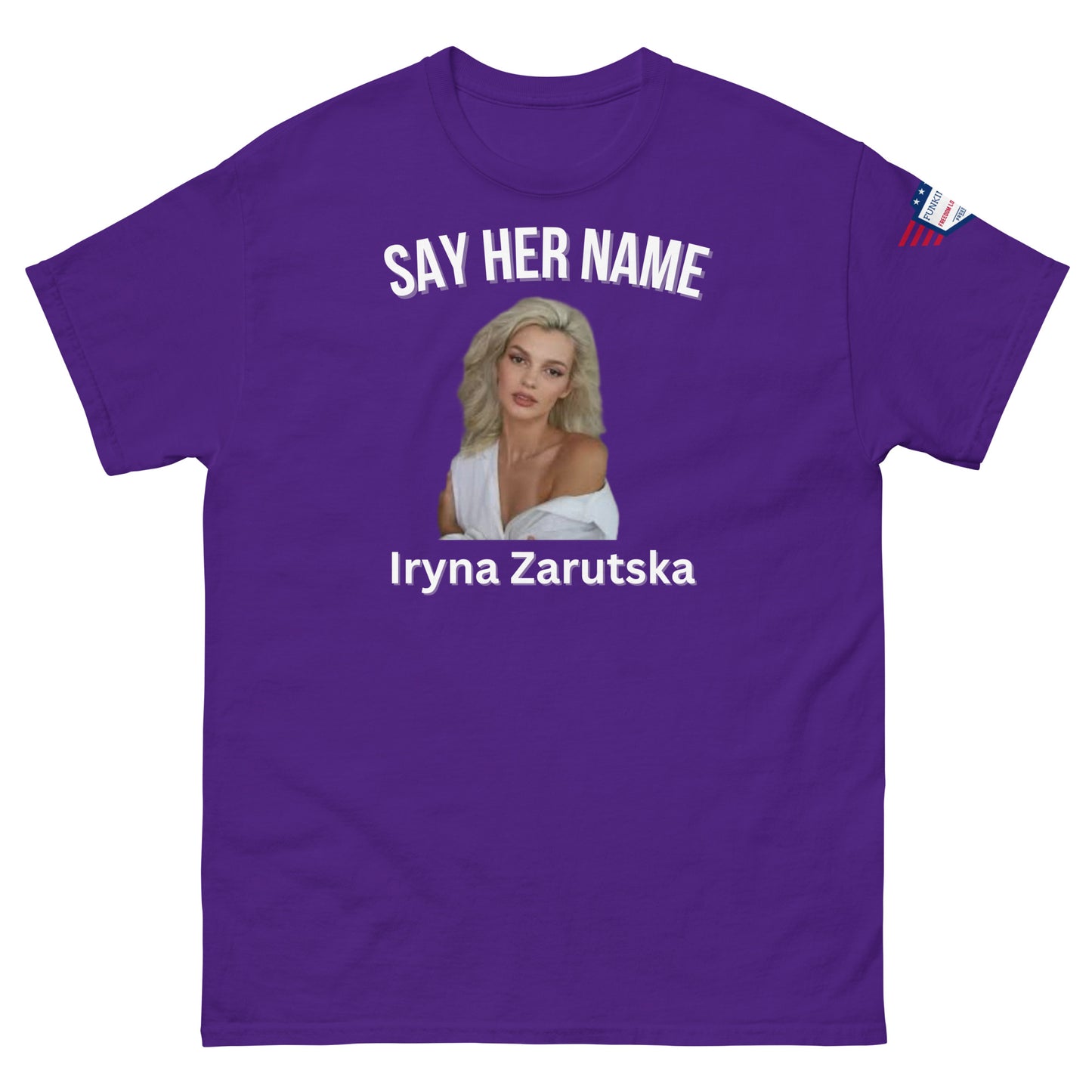 Front view of purple unisex tee boasting "SAY HER NAME", Iryna Zarzutska close-up portrait, name print, flag sleeve detail