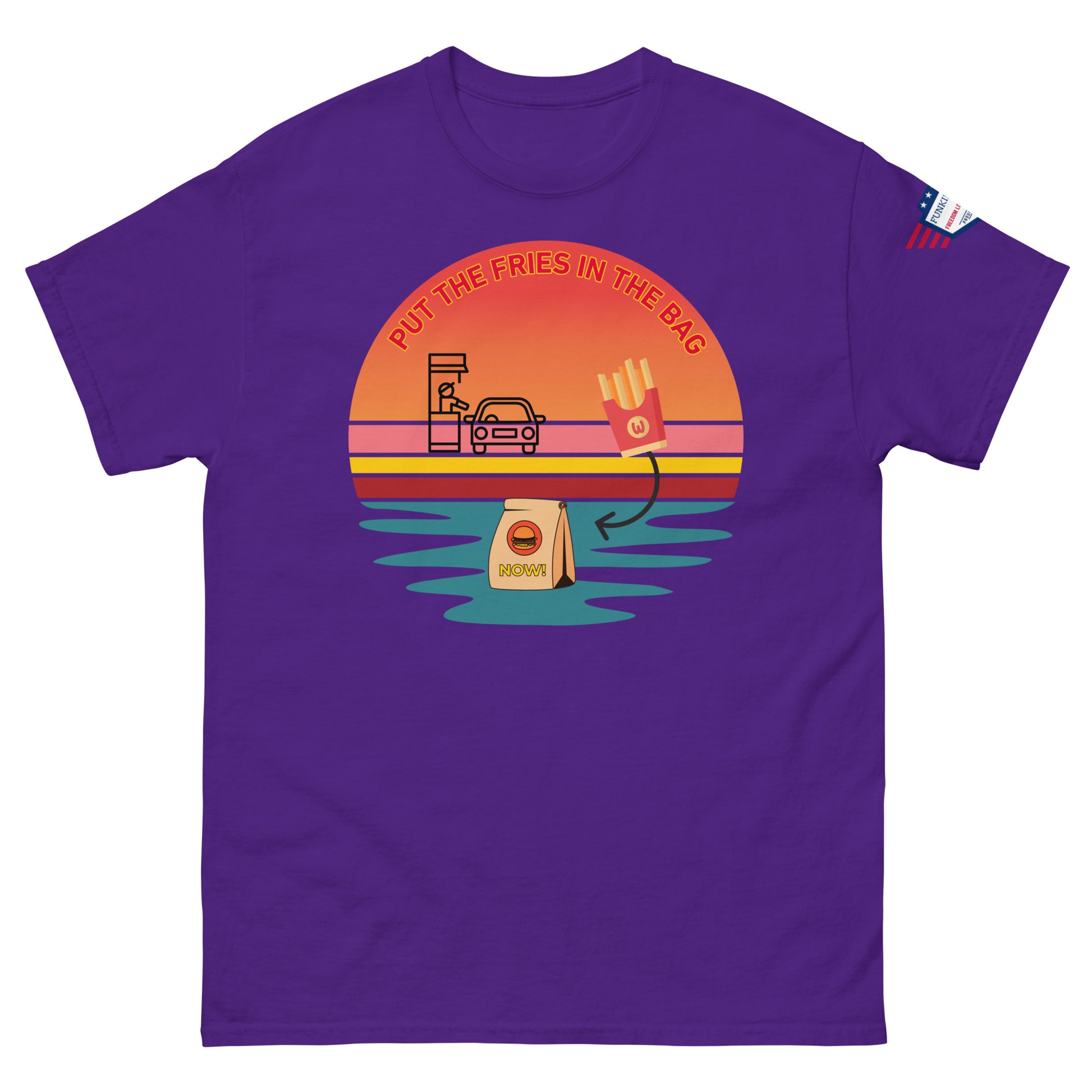 Front view of purple T-shirt featuring "PUT THE FRIES IN THE BAG" sunset drive-thru print with McD vibes and US flag patch