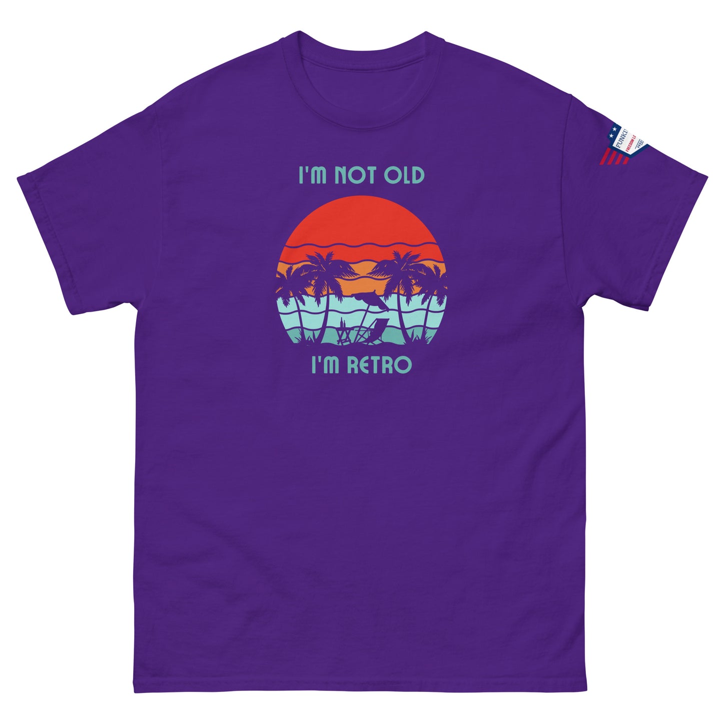 Front view of purple "I'm Not Old I'm Retro" t-shirt with palm tree sunset vibes and sleeve flag